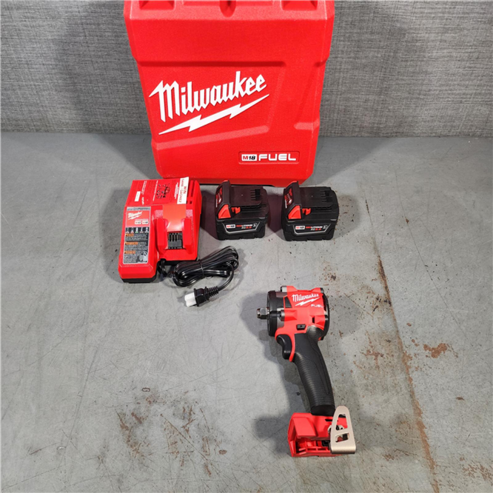 HOUSTON LOCATION - AS-IS MILWAUKEE 0.5 in. 18V Brushless Compact Impact Wrench with Friction Ring Kit, Red & Black