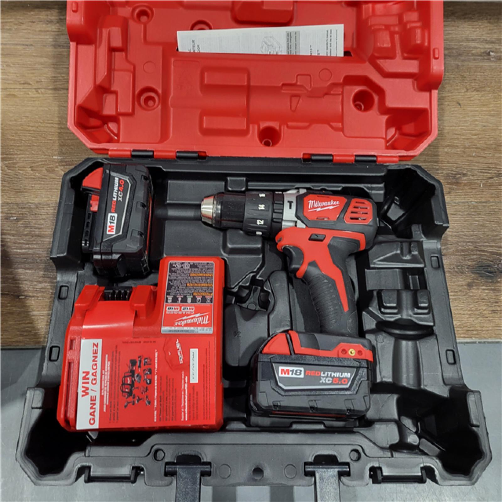 AS-IS Milwaukee M18 FUEL 18V Lithium-Ion Brushless Cordless Hammer Drill and Impact Driver Combo Kit (2-Tool) with 2 Batteries