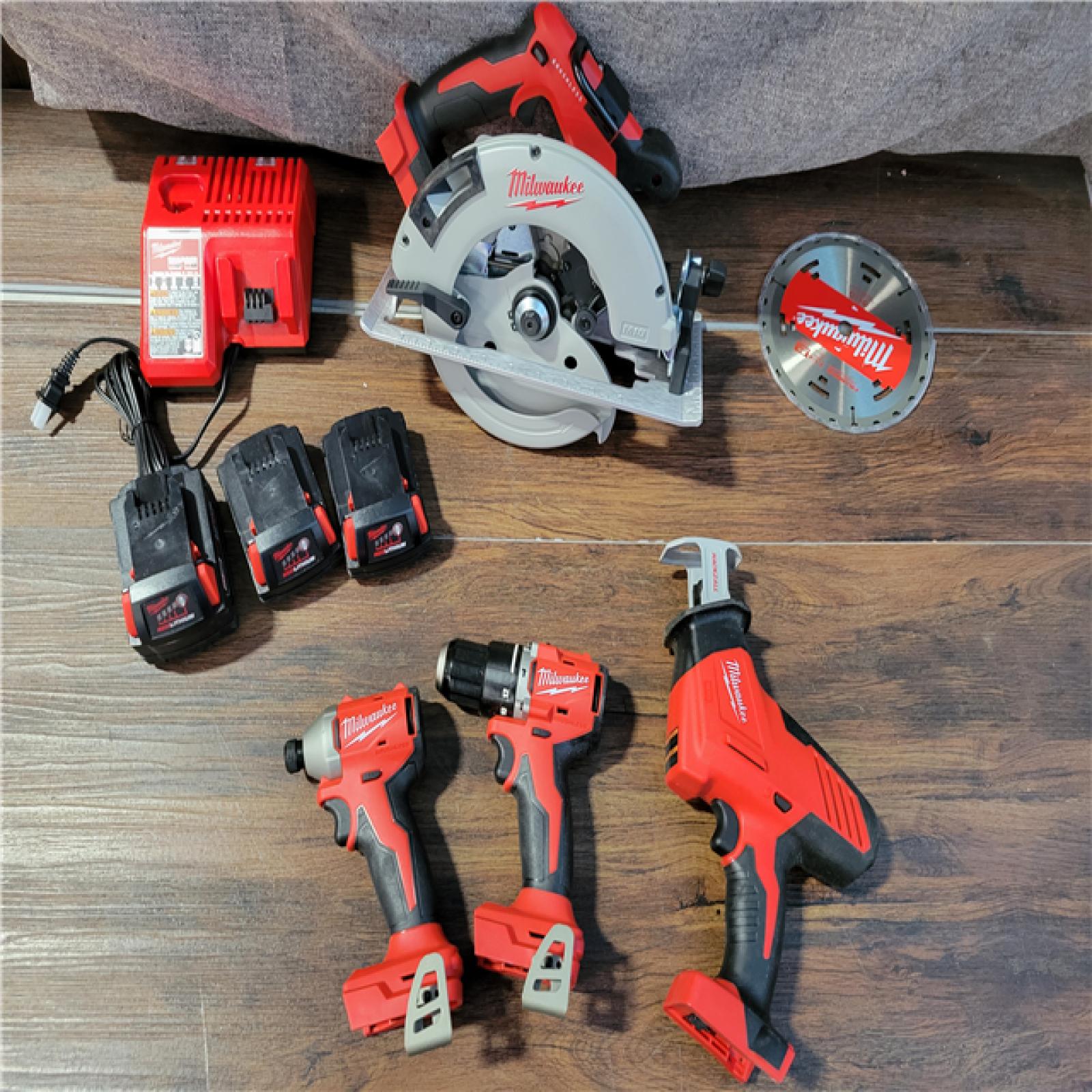 CALIFORNIA NEW MILWAUKEE M18 4-TOOL COMBO KIT (3 BATTERIES, 1 CHARGER, AND BAG INCLUDED)