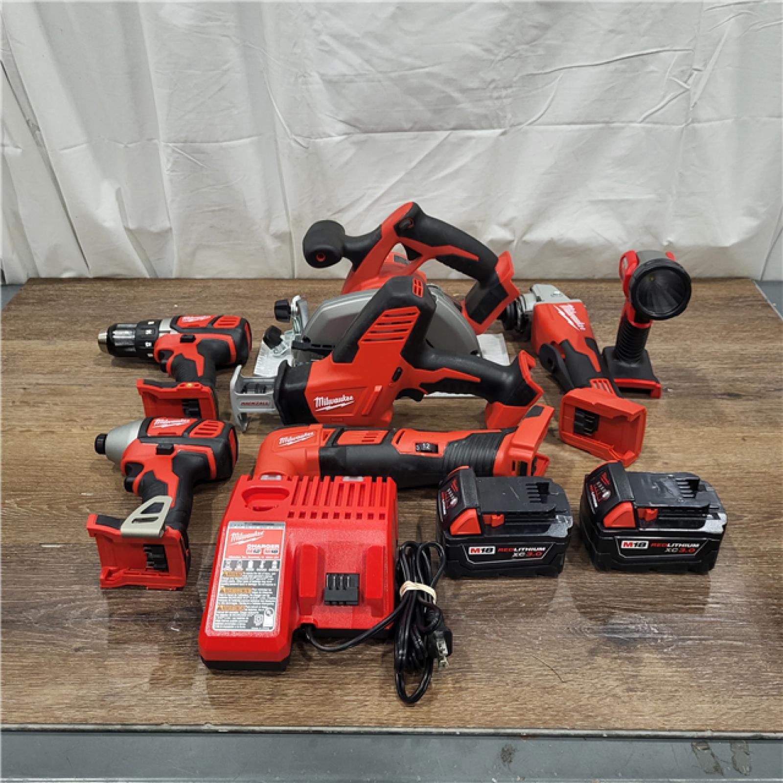 AS-IS M18 18-Volt Lithium-Ion Cordless Combo Kit 7-Tool with 2-Batteries, Charger and Tool Bag