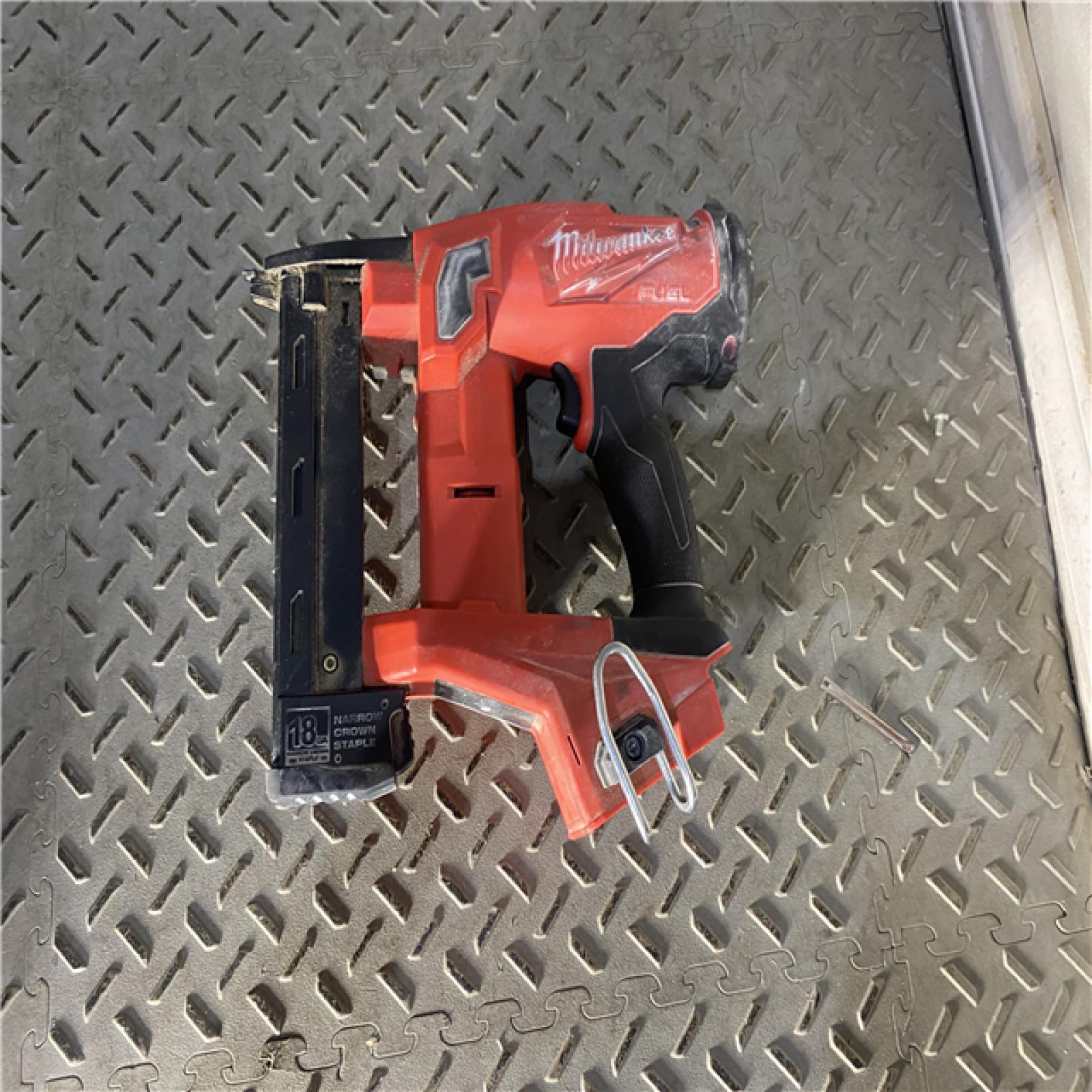 Houston location AS-IS MILWAUKEE M18 FUEL 18-Volt Lithium-Ion Brushless Cordless 18-Gauge 1/4 in. Narrow Crown Stapler (Tool-Only)