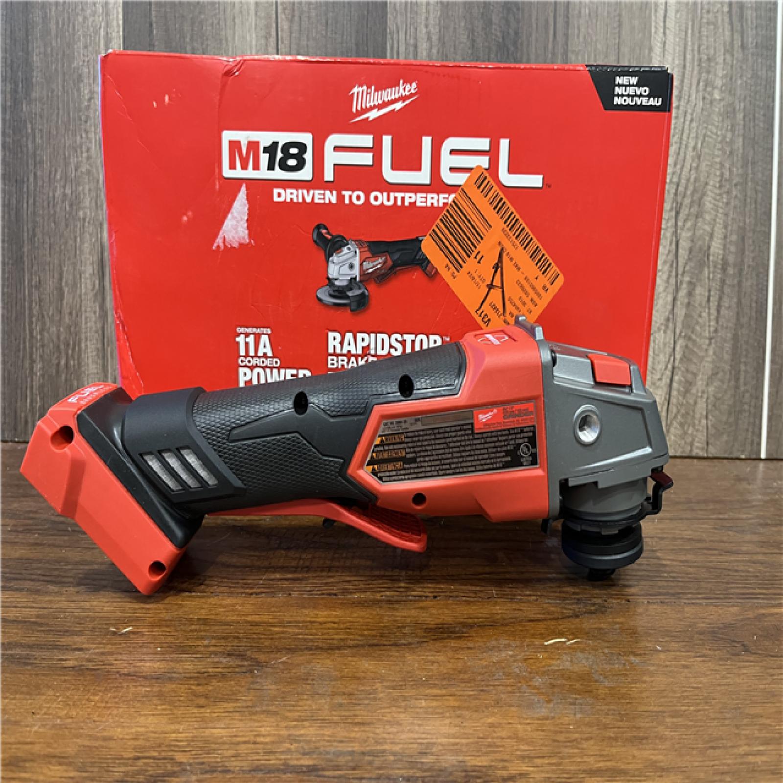 AS-IS Milwaukee  M18 FUEL 18-Volt Lithium-Ion Brushless Cordless 4-1/2 in./5 in. Grinder W/Paddle Switch (Tool-Only)