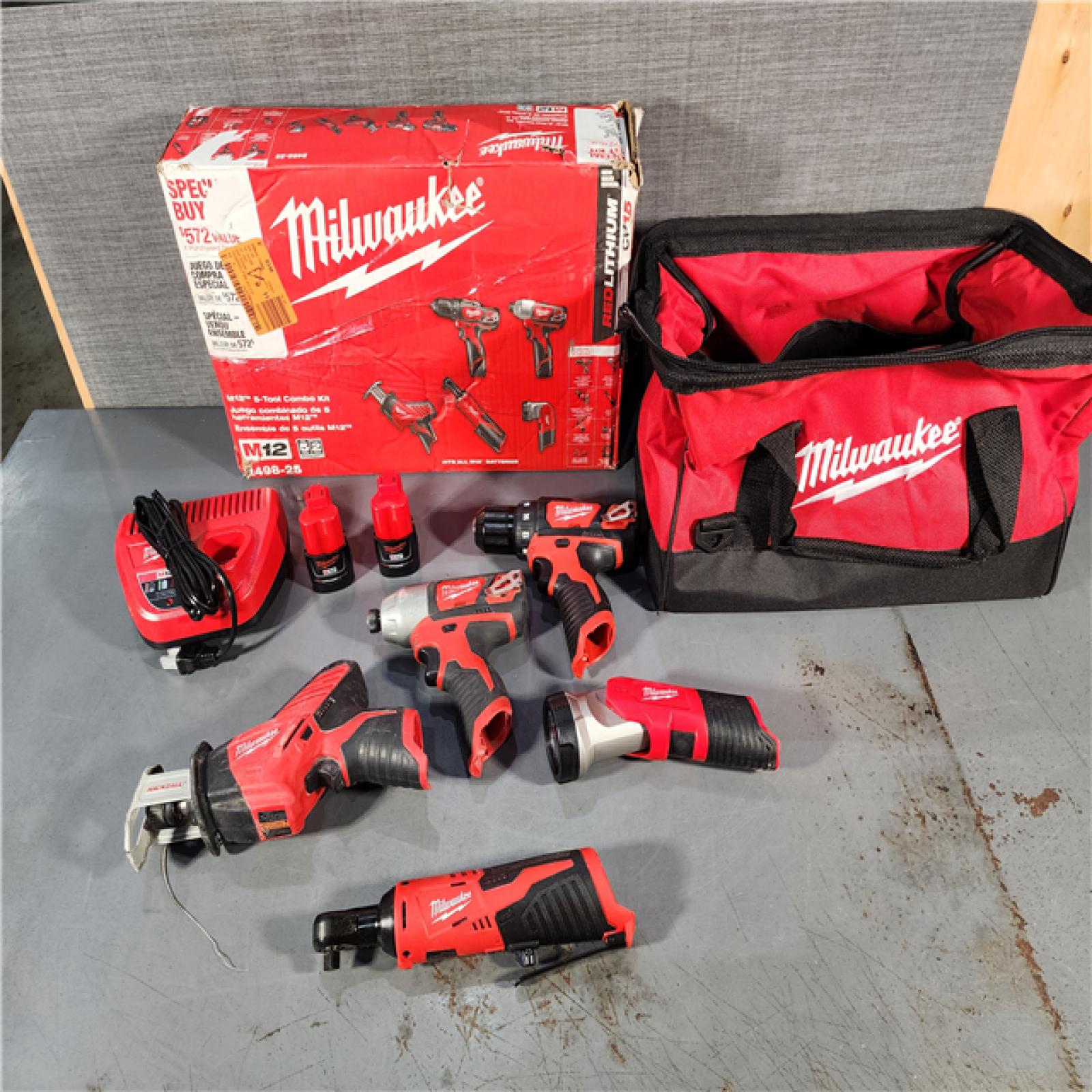 HOUSTON LOCATION - AS-IS MILWAUKEE M12 12V Lithium-Ion Cordless Combo Kit (5-Tool) with Two 1.5Ah Batteries, Charger & Tool Bag