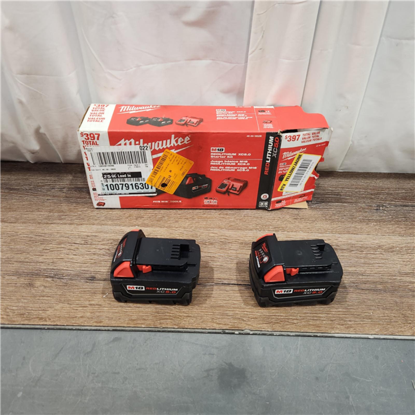 AS IS M18 18-Volt Lithium-Ion XC Starter Kit with Two 5.0Ah Batteries and Charger