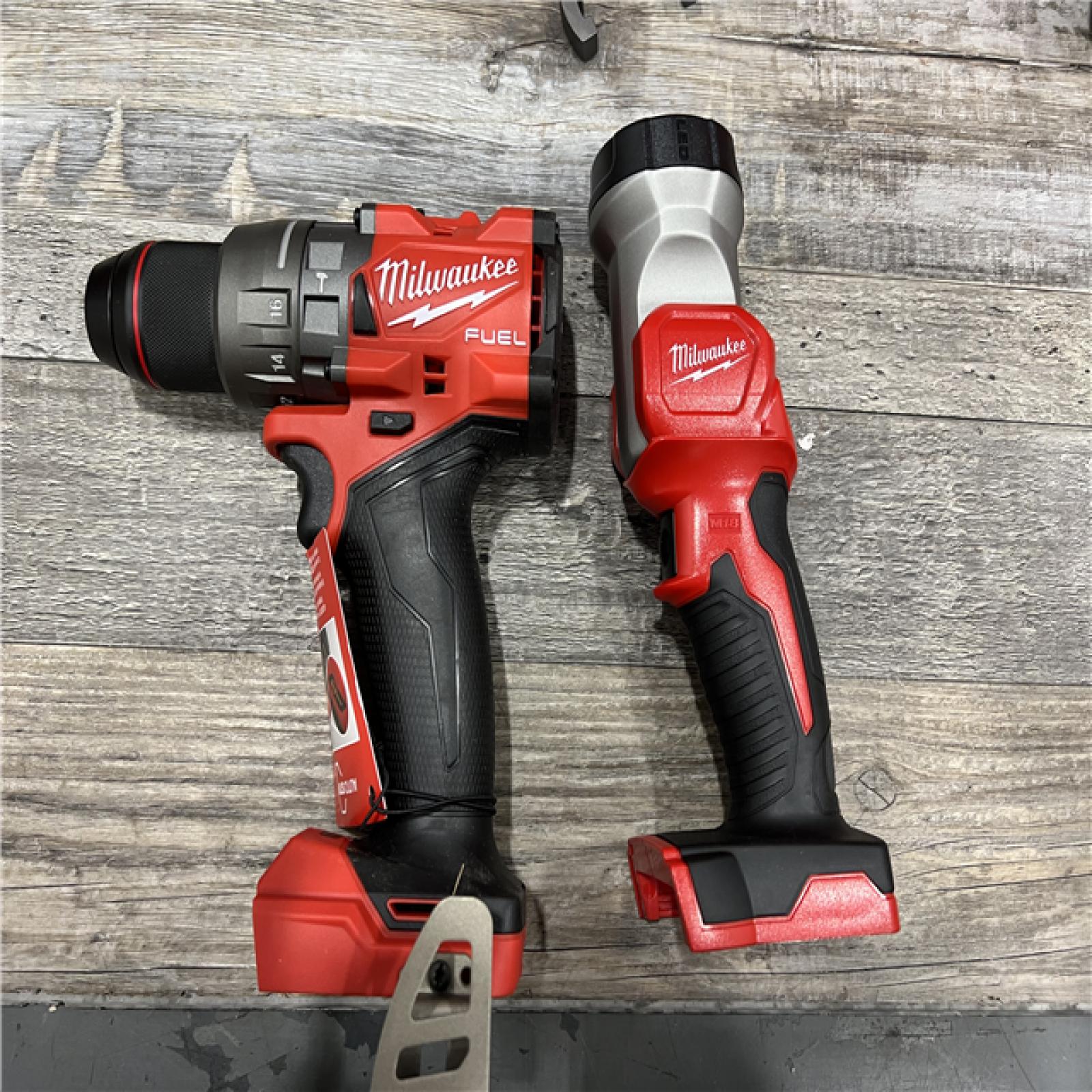 AS-IS Milwaukee M18 FUEL 18V Lithium-Ion Brushless Cordless Combo Kit with Two 5.0 Ah Batteries  1 Charger  2 Tool Bags (7-Tool)