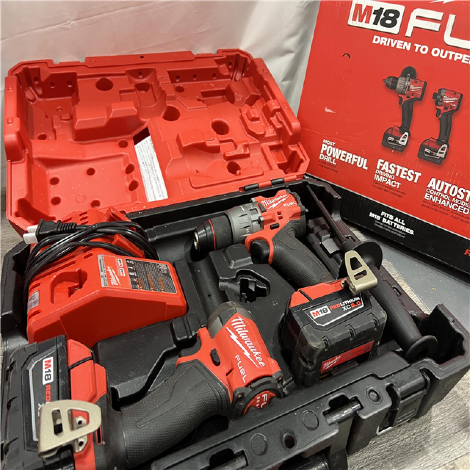 AS-IS MILWAUKEE M18 FUEL 18V Lithium-Ion Brushless Cordless Hammer Drill and Impact Driver Combo Kit (2-Tool) with 2 Batteries