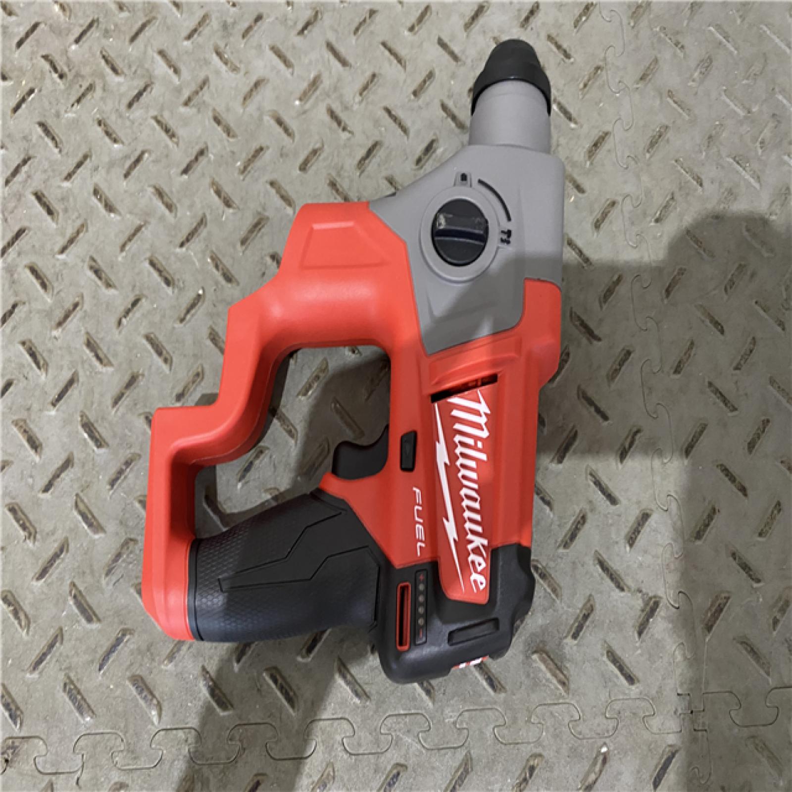 Houston location AS-IS Milwaukee 2915-20 M18 FUEL 18-Volt Lithium-Ion Brushless Cordless SDS-Plus 1-1/8 in. Rotary Hammer Drill (Tool-Only)