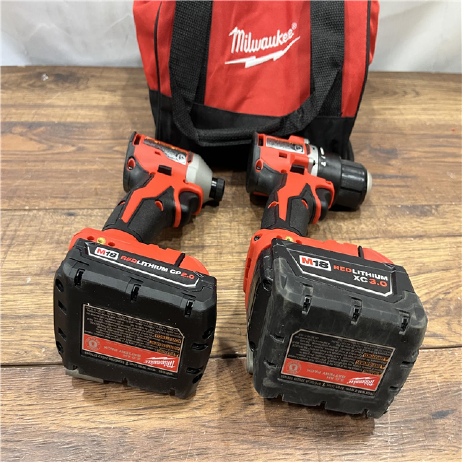 AS IS M18 18-Volt Lithium-Ion Brushless Cordless Compact Hammer Drill/Impact Combo Kit (2-Tool) with (2) Batteries, Bag