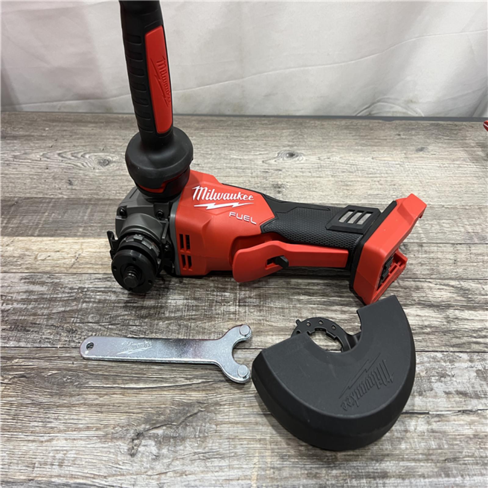 AS-IS Milwaukee 2880-20 M18 FUEL 18-Volt Lithium-Ion Brushless Cordless 4-1/2 in./5 in. Grinder W/Paddle Switch (Tool-Only)