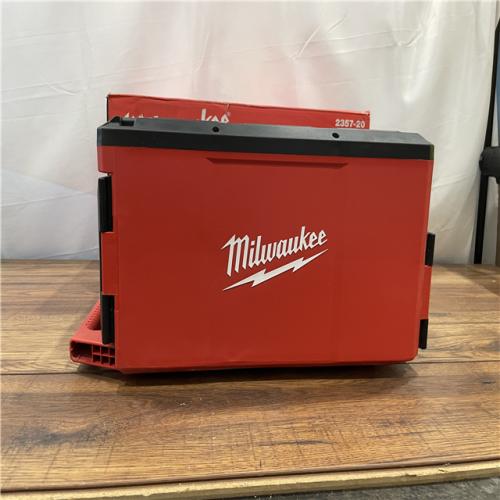 AS-IS Milwaukee  M18 PACKOUT Cordless Lithium-Ion Light/Charger (Tool Only)