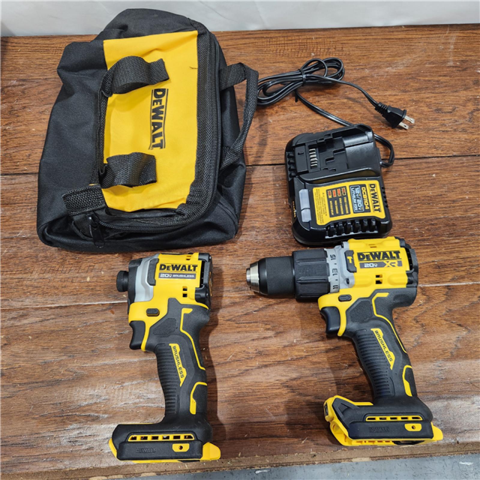 AS-IS 20V MAX XR Hammer Drill and ATOMIC Impact Driver 2 Tool Cordless Combo Kit with (2) 4.0Ah Batteries, Charger, and Bag