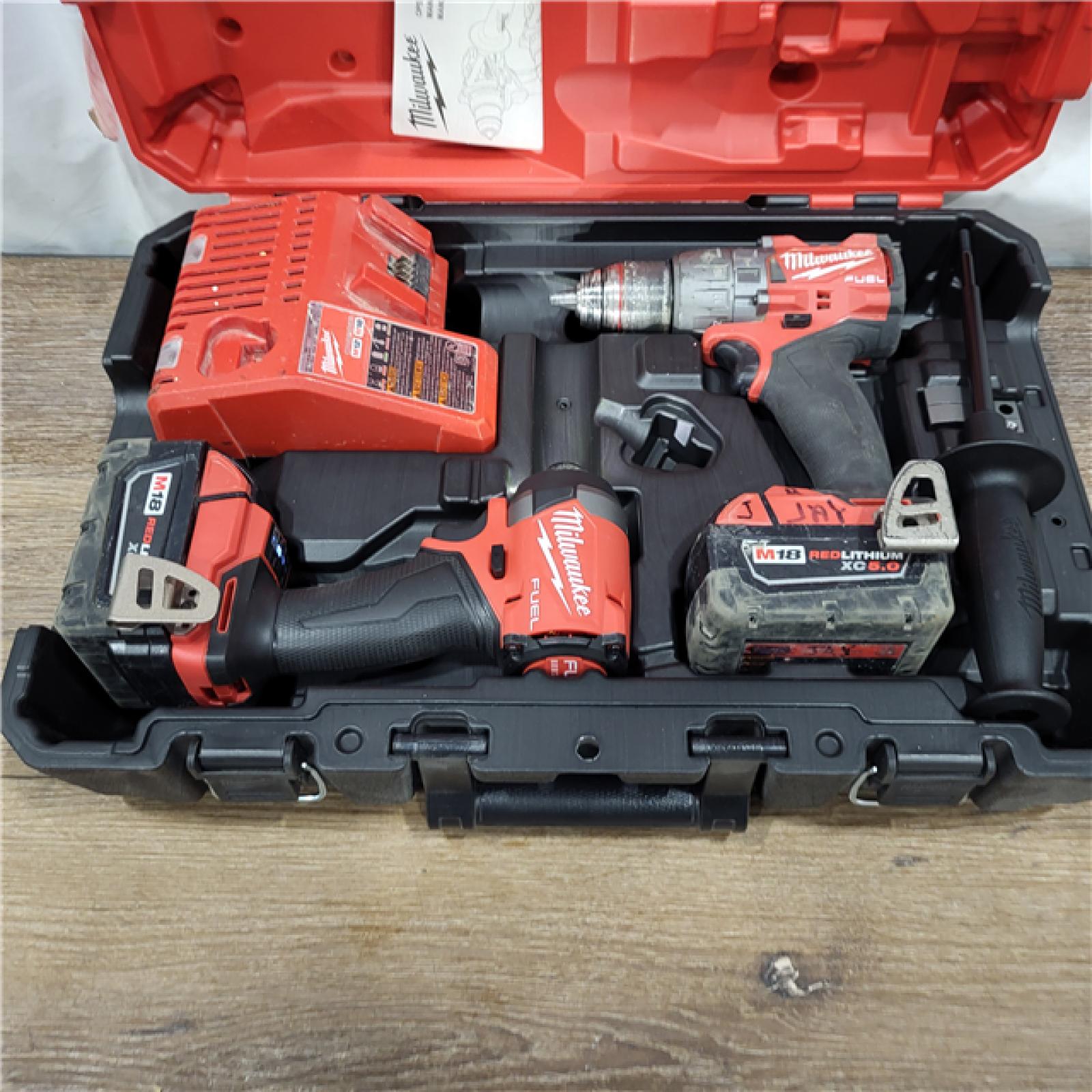 AS-IS M18 FUEL 18V Lithium-Ion Brushless Cordless Hammer Drill and Impact Driver Combo Kit (2-Tool) with 2 Batteries