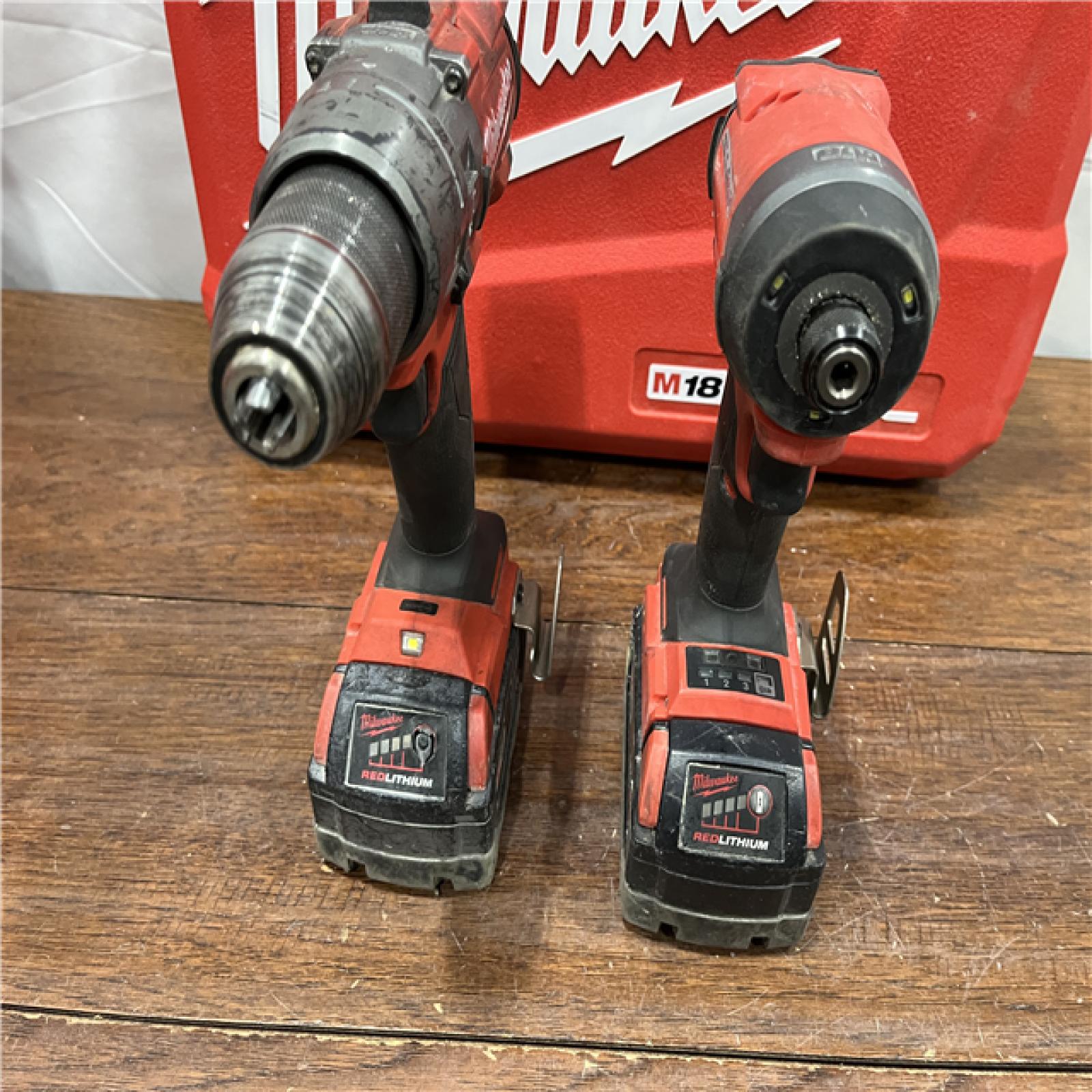 AS-ISMilwaukee M18 FUEL 18V Lithium-Ion Brushless Cordless Hammer Drill and Impact Driver Combo Kit (2-Tool) with 2 Batteries