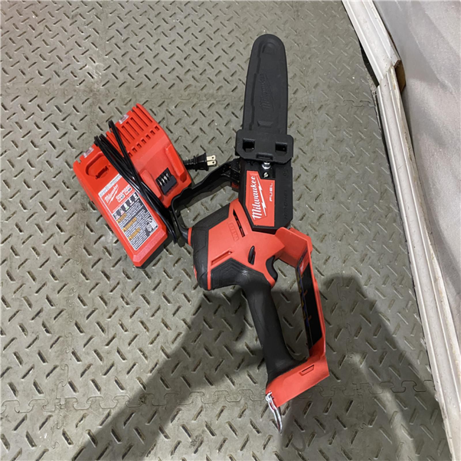 Houston location AS-IS MILWAUKEE M18 FUEL 8 in. 18V Lithium-Ion Brushless HATCHET Pruning Saw Charger ONLY