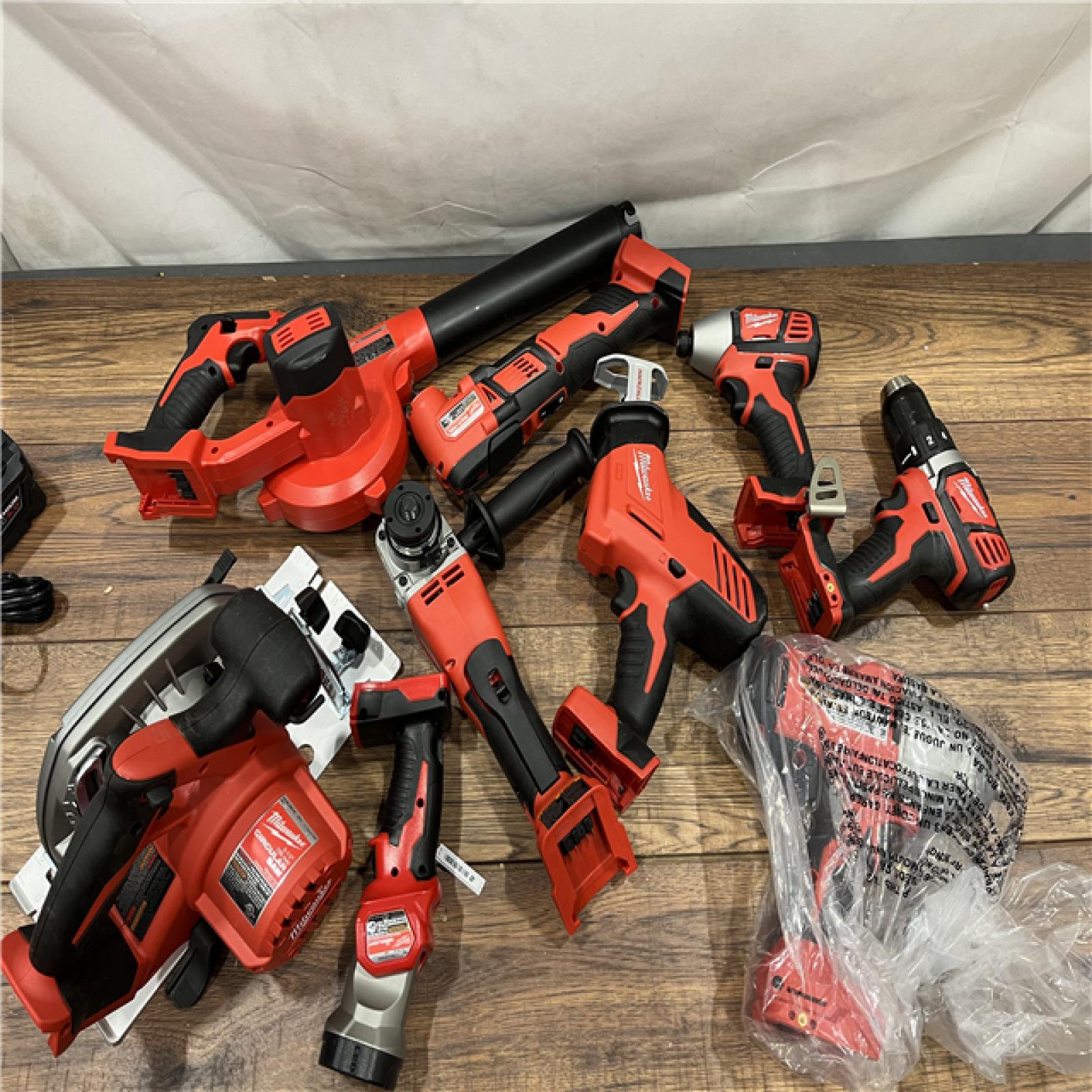 AS-IS Milwaukee M18 18-Volt Lithium-Ion Cordless Combo Kit (9-Tool) with (2) Batteries, Charger, and Tool Bag