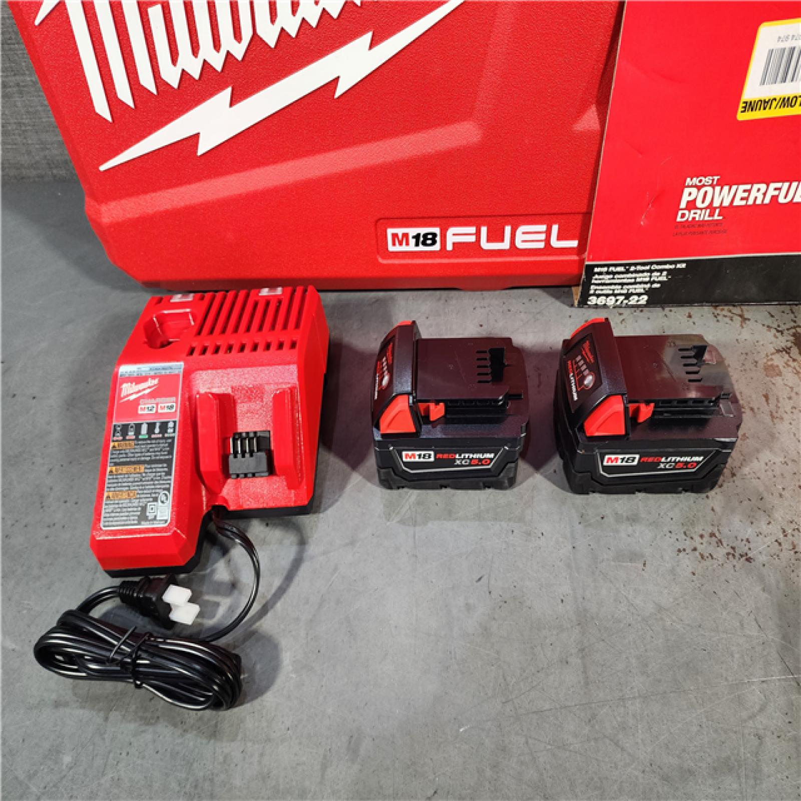 HOUSTON LOCATION - AS-IS (APPEARS LIKE NEW) Milwaukee M18 FUEL 18V Lithium-Ion Brushless Cordless Hammer Drill and Impact Driver Combo Kit (2-Tool) with 2 Batteries