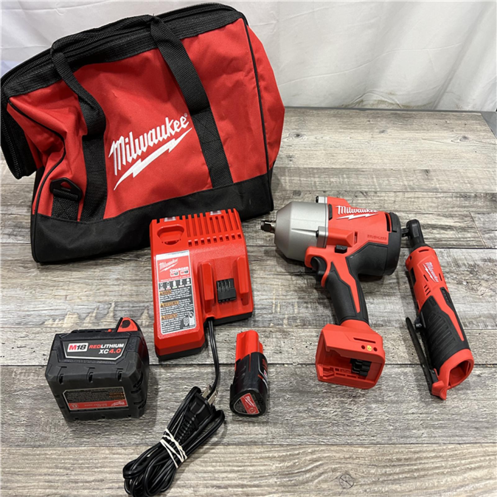 AS-IS MILWAUKEE M12/M18 12/18V Lithium-Ion Cordless 3/8 in. Ratchet and 1/2 in. High Torque Impact Wrench with Friction Ring Combo Kit