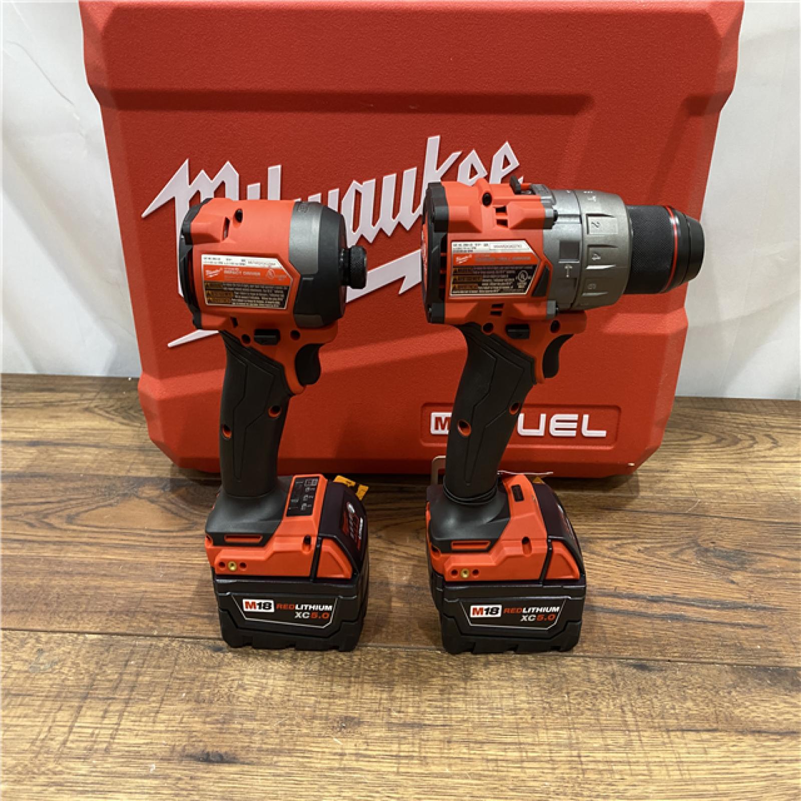 AS IS Milwaukee M18 FUEL 18V Lithium-Ion Brushless Cordless Hammer Drill and Impact Driver Combo Kit (2-Tool) with 2 Batteries