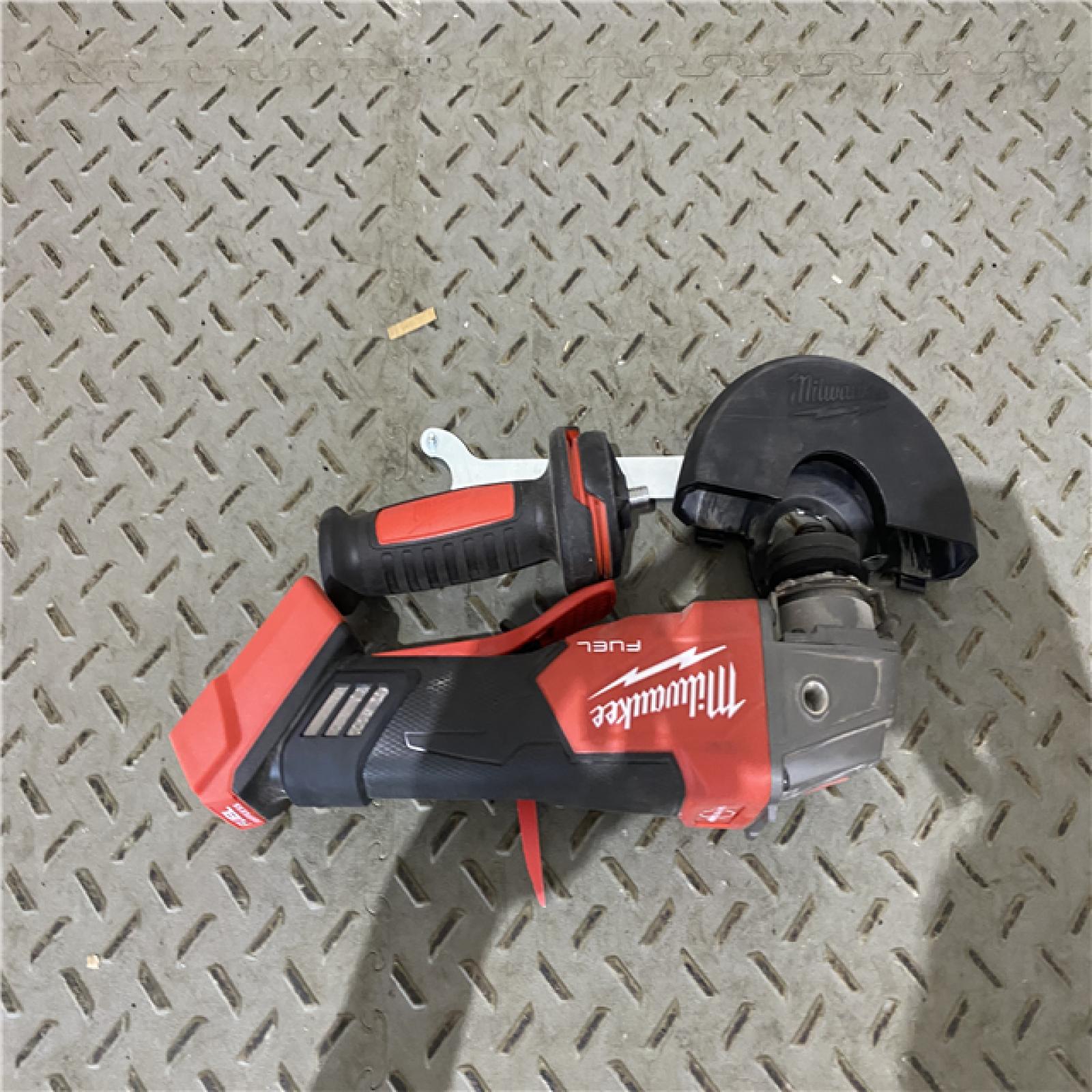 Houston location AS-IS Milwaukee 2880-20 M18 FUEL 18-Volt Lithium-Ion Brushless Cordless 4-1/2 in./5 in. Grinder W/Paddle Switch (Tool-Only)