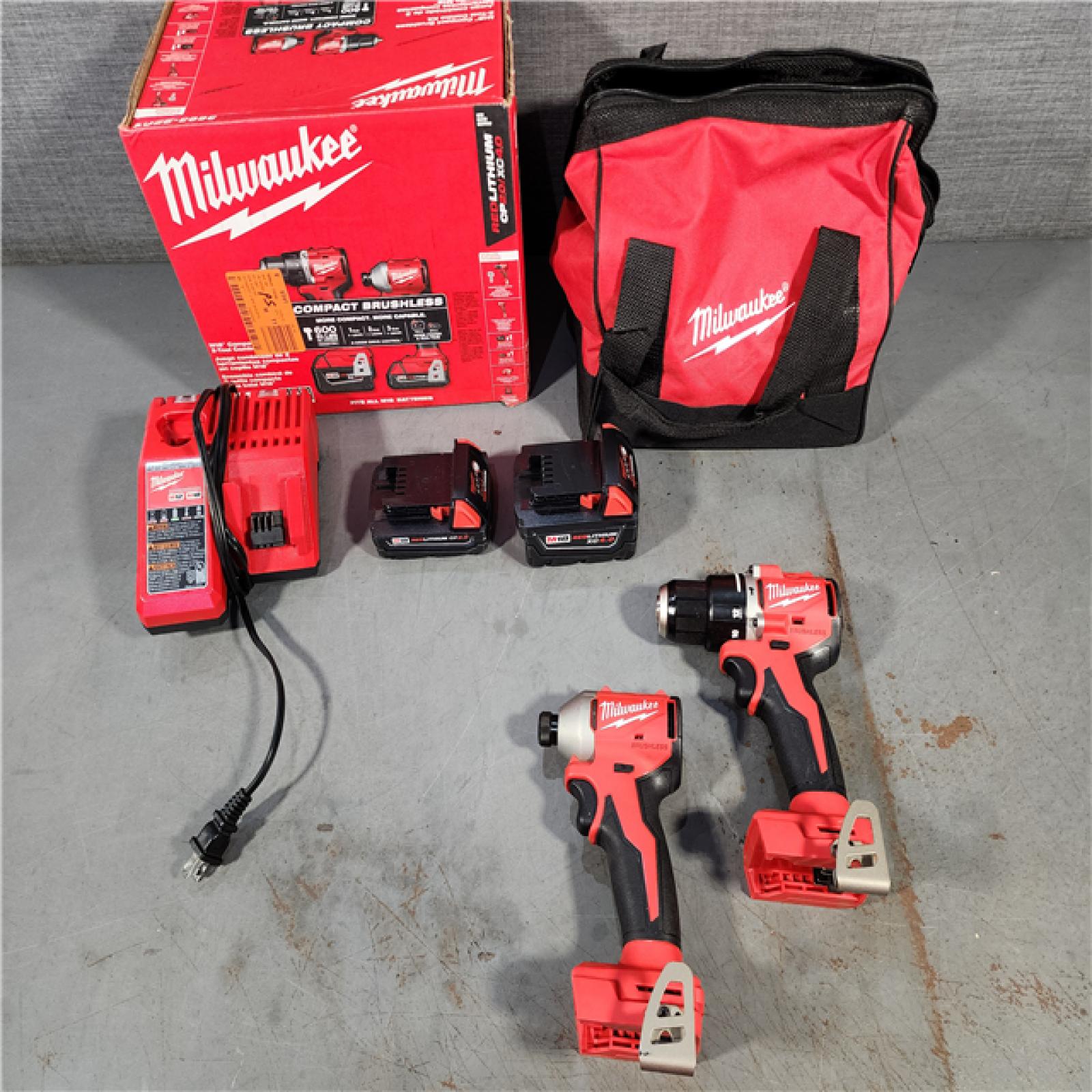 HOUSTON LOCATION - AS-IS M18 18-Volt Lithium-Ion Brushless Cordless Compact Hammer Drill/Impact Combo Kit (2-Tool) with (2) Batteries, Bag