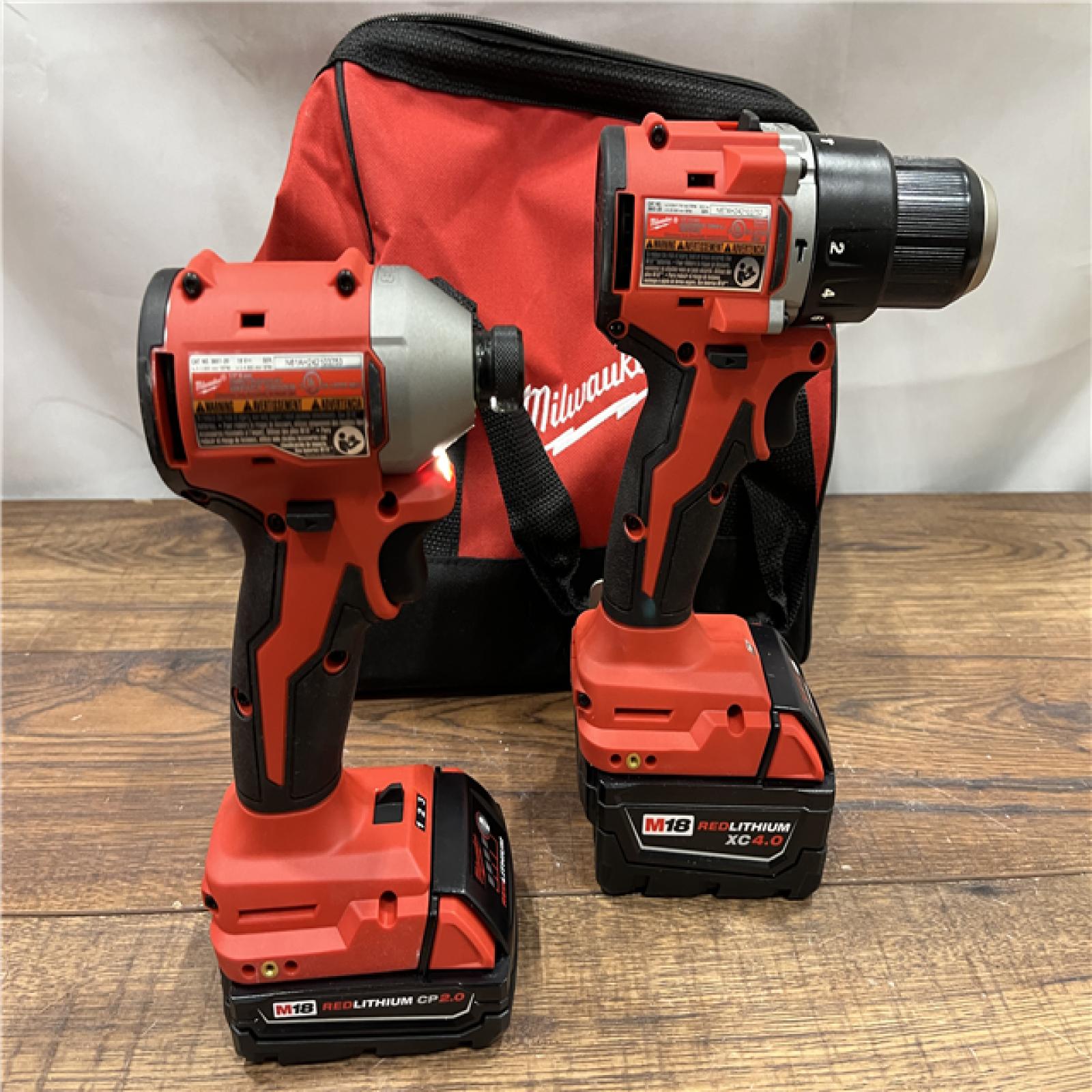 AS IS M18 18-Volt Lithium-Ion Brushless Cordless Compact Hammer Drill/Impact Combo Kit (2-Tool) with (2) Batteries, Bag