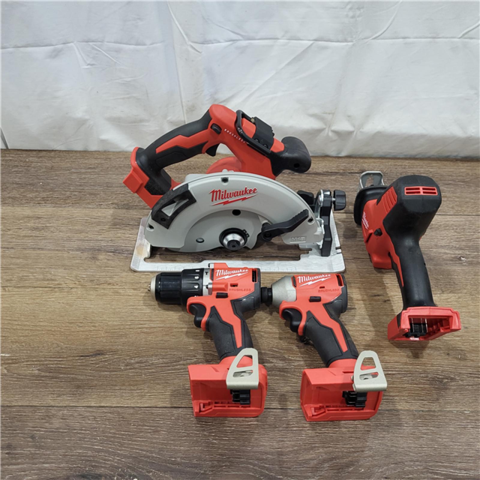 AS-IS M18 18-Volt Lithium-Ion Brushless Cordless Combo Kit (4-Tool) with 2-Batteries, 1-Charger and Tool Bag