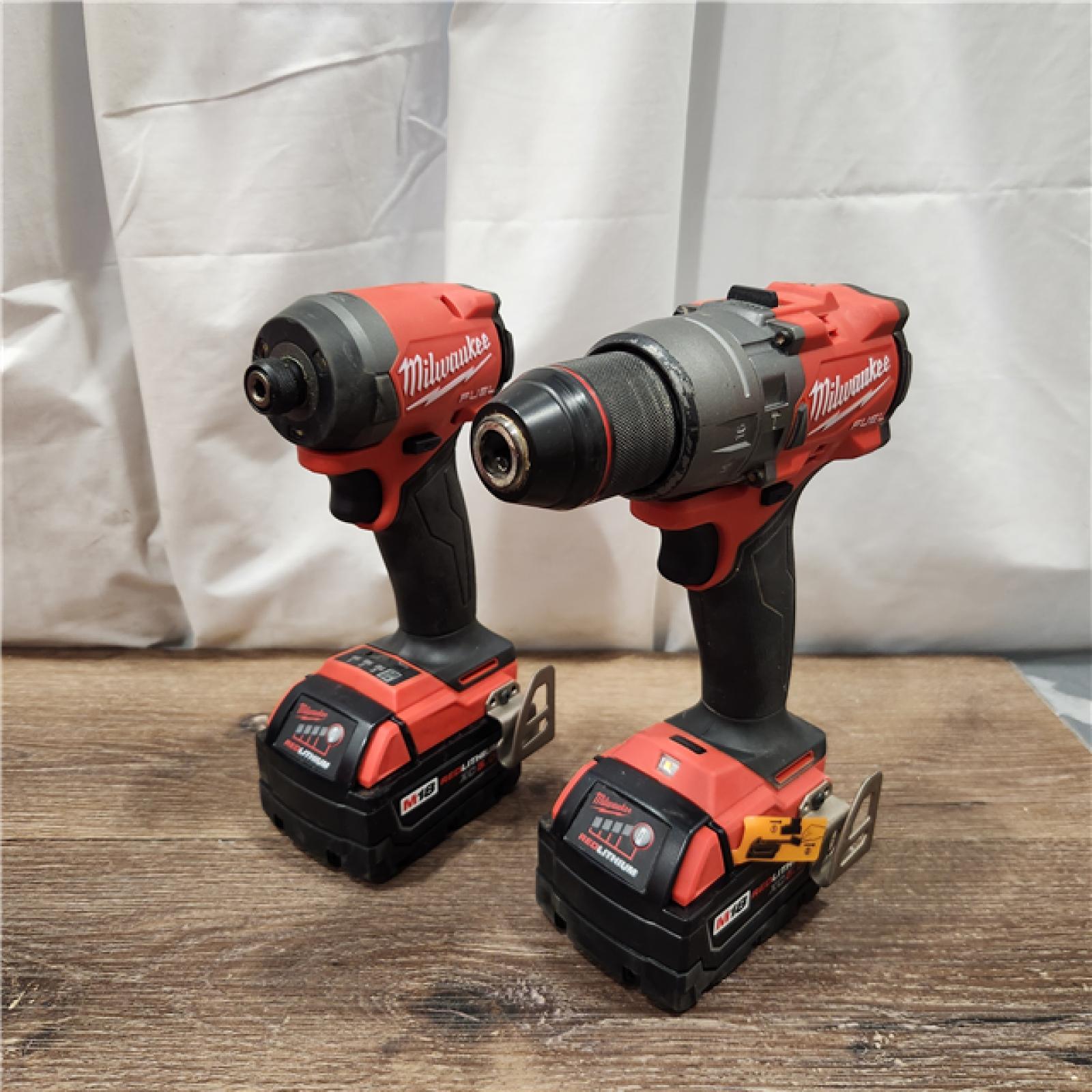 AS-IS Milwaukee M18 FUEL 18V Lithium-Ion Brushless Cordless Hammer Drill and Impact Driver Combo Kit (2-Tool) with 2 Batteries