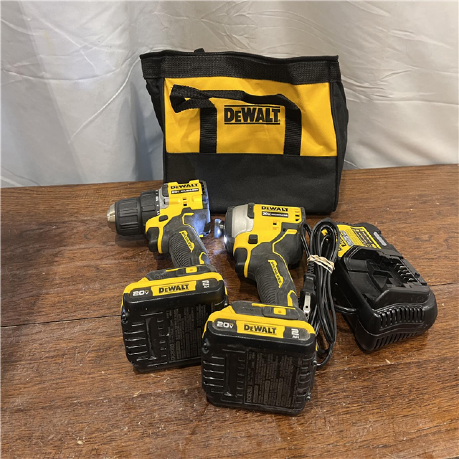 AS-ISDewalt DCK225D2 20V MAX ATOMIC Brushless Compact Lithium-Ion 1/2 in. Cordless Drill Driver and 1/4 in. Impact Driver Combo Kit with 2 Batteries 2 Ah