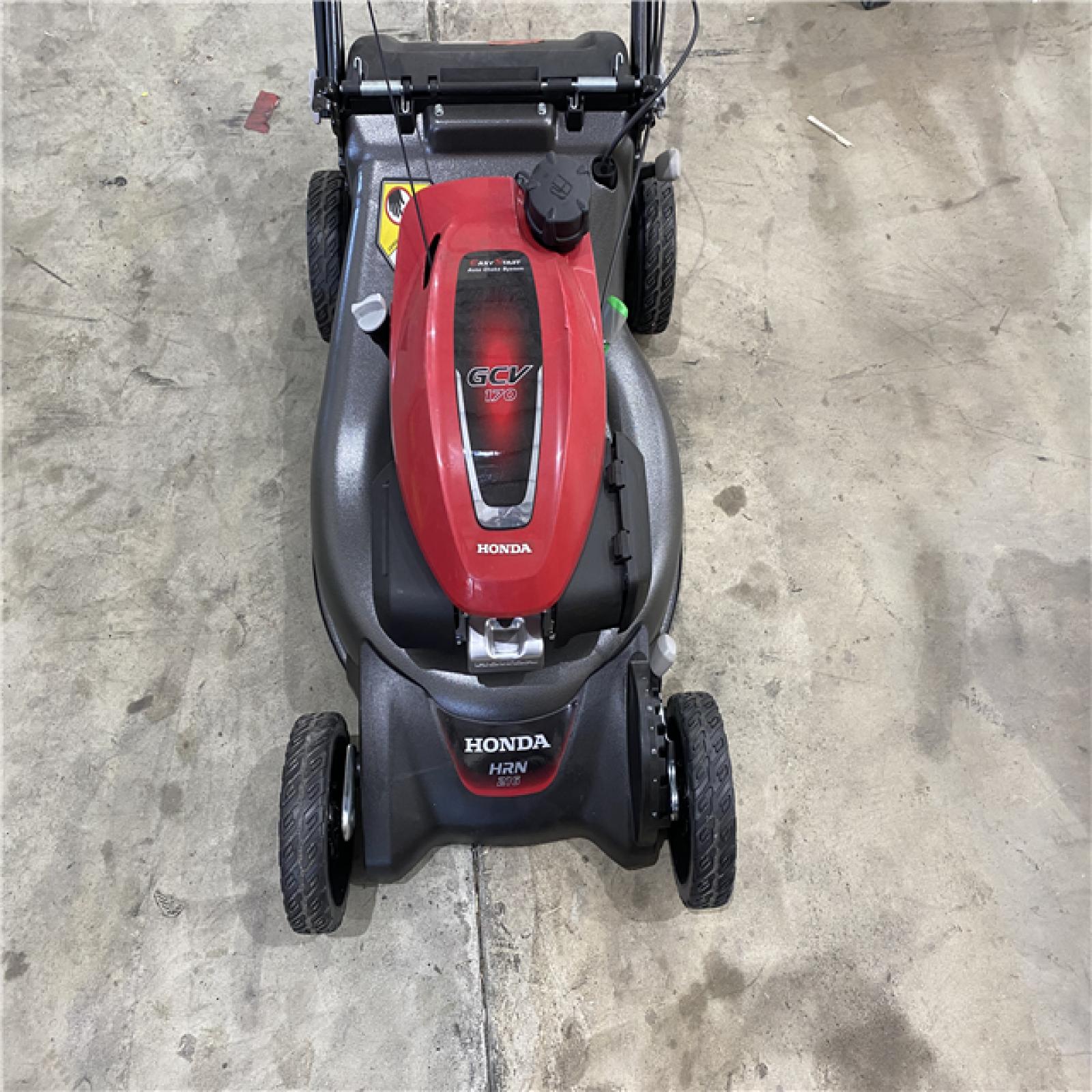 Houston location AS-IS HONDA LAWN MOWER 216