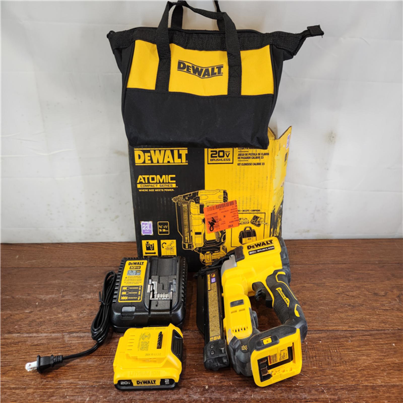 AS-IS DEWALT ATOMIC COMPACT 20V MAX Brushless Cordless 23 Ga. Pin Nailer Kit