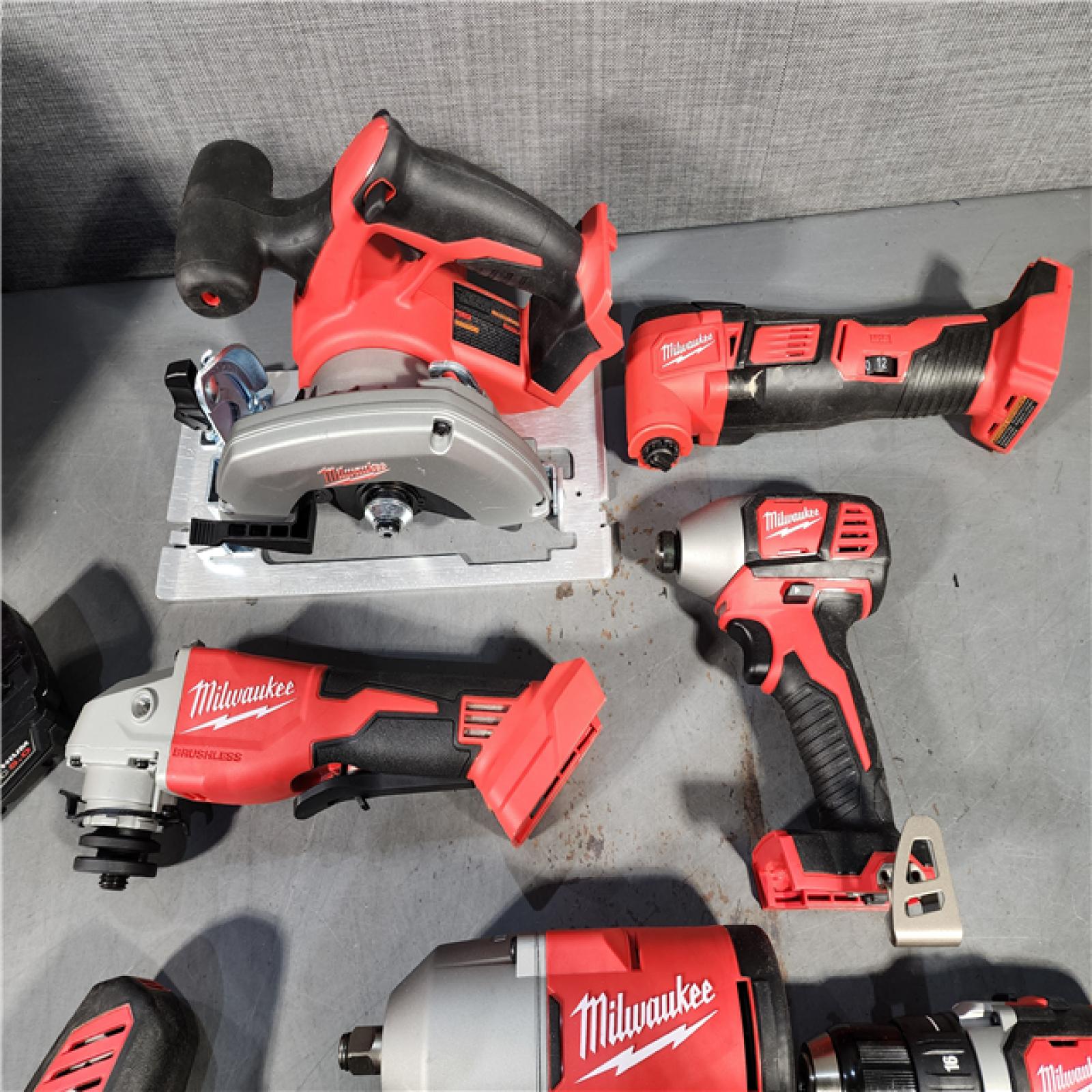 HOUSTON LOCATION - AS-IS M18 18-Volt Lithium-Ion Cordless Combo Kit (7-Tool) with (2) Batteries, Charger, and Tool Bag