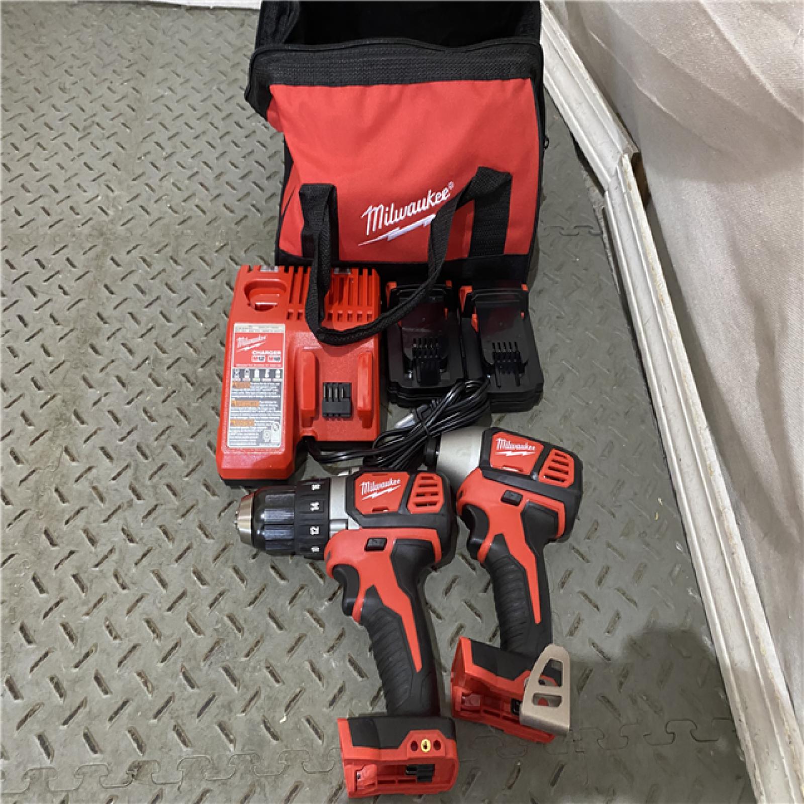 Houston location AS-IS Milwaukee Electric Tools 2691-22 MILWAUKEE M18 COMBO KITS LIKE NEW