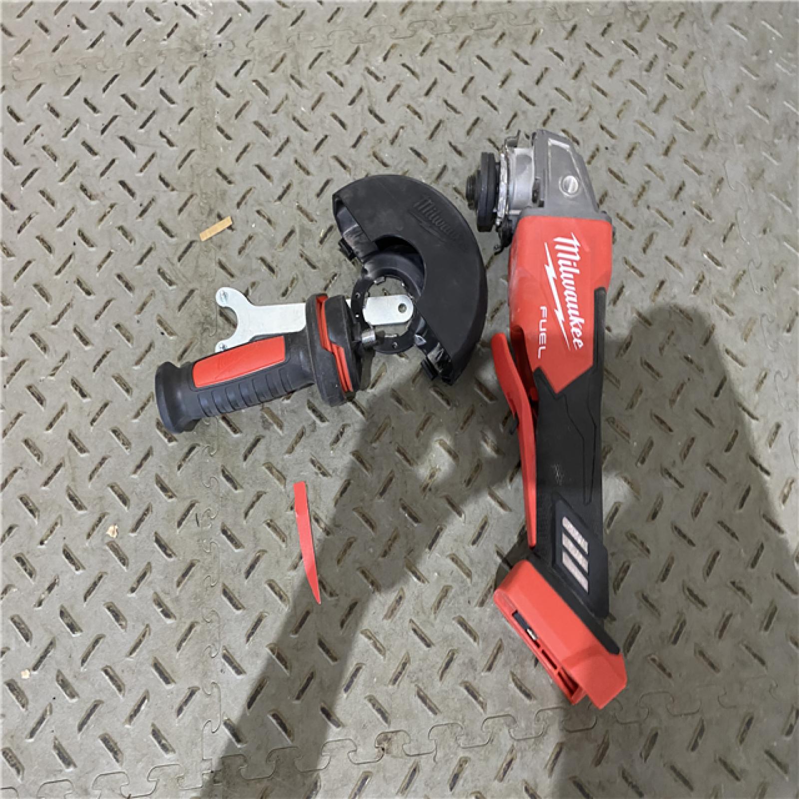 Houston location AS-IS Milwaukee 2880-20 M18 FUEL 18-Volt Lithium-Ion Brushless Cordless 4-1/2 in./5 in. Grinder W/Paddle Switch (Tool-Only)