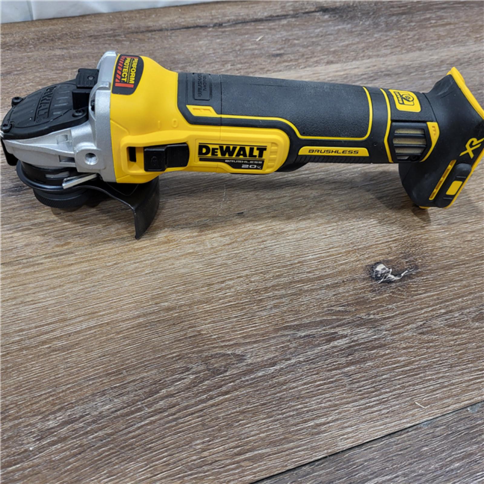 AS-IS DeWalt 20V MAX XR Cordless Brushless 4.5 in. Slide Switch Small Angle Grinder with Kickback Brake (Tool Only)