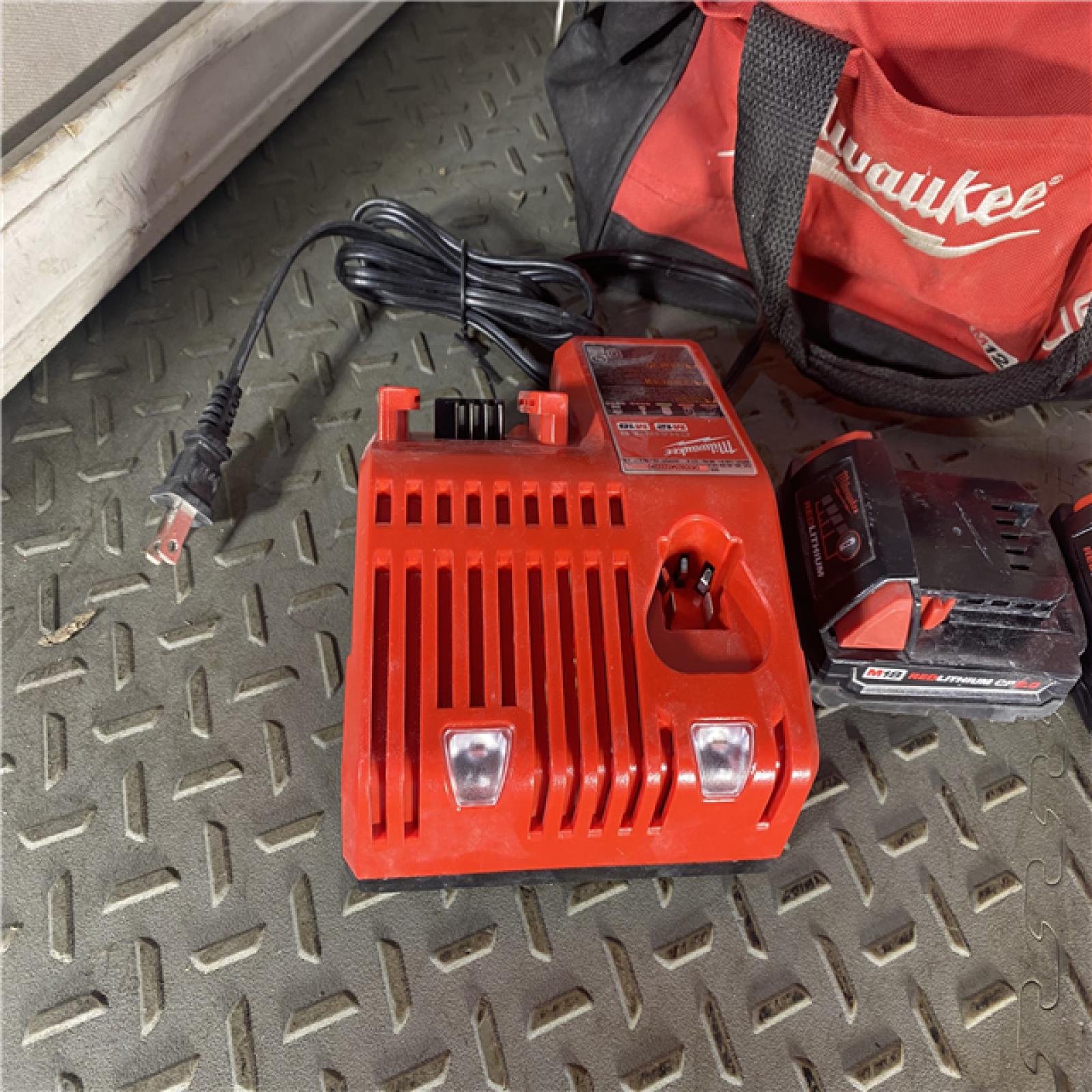 HOUSTON LOCATION - AS-ISMilwaukee M18 Compact Brushless 1/4  Hex Impact Driver Kit