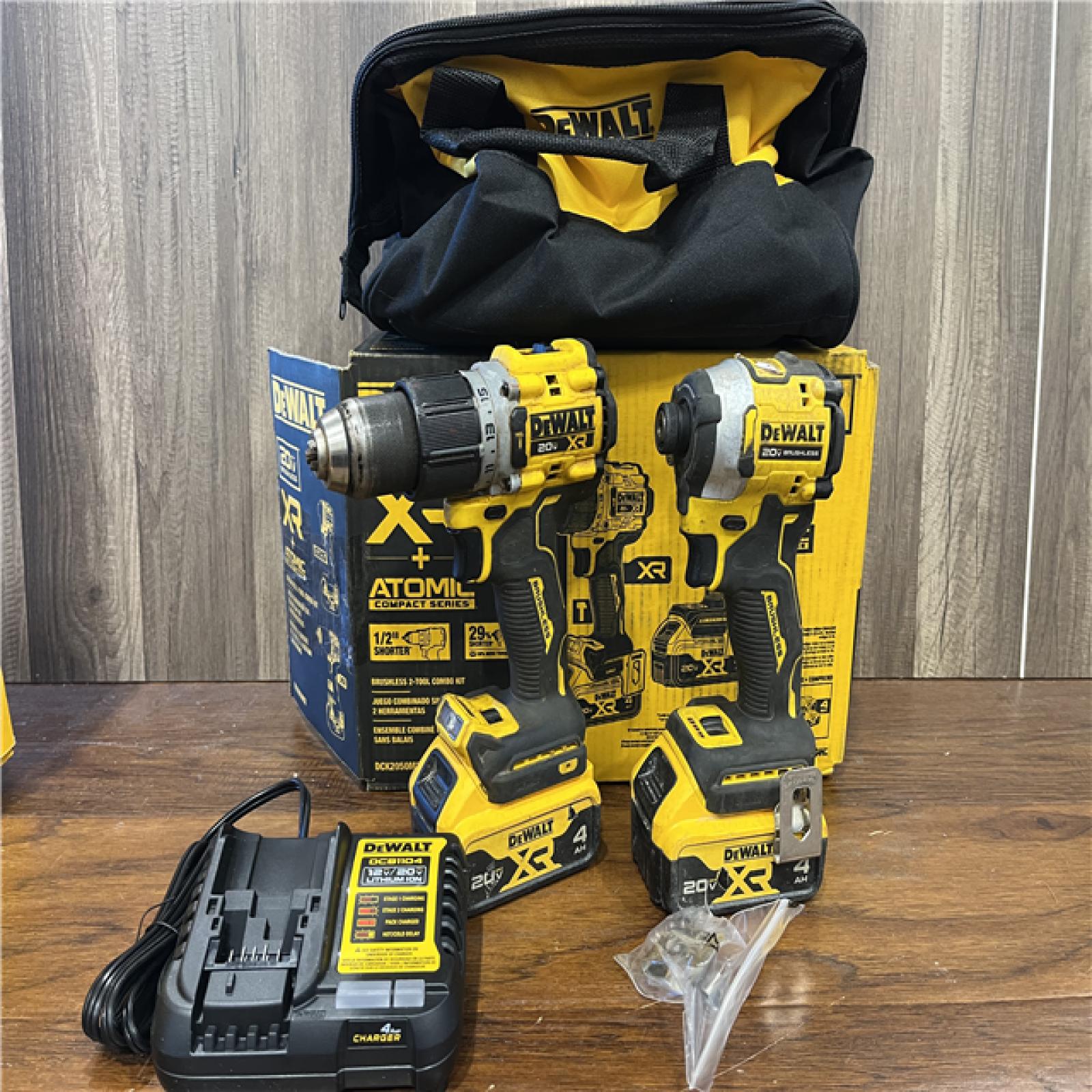 AS-IS DEWALT 20V MAX XR Hammer Drill and ATOMIC Impact Driver 2 Tool Cordless Combo Kit with (2) 4.0Ah Batteries, Charger, and Bag