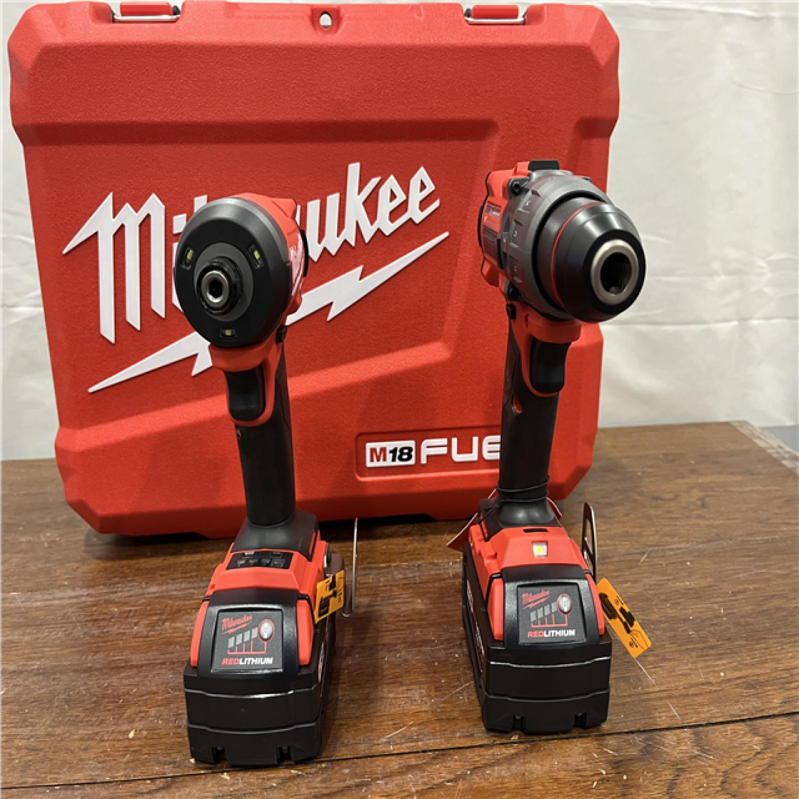 AS-IS Milwaukee M18 FUEL 18V Lithium-Ion Brushless Cordless Hammer Drill and Impact Driver Combo Kit (2-Tool) with 2 Batteries