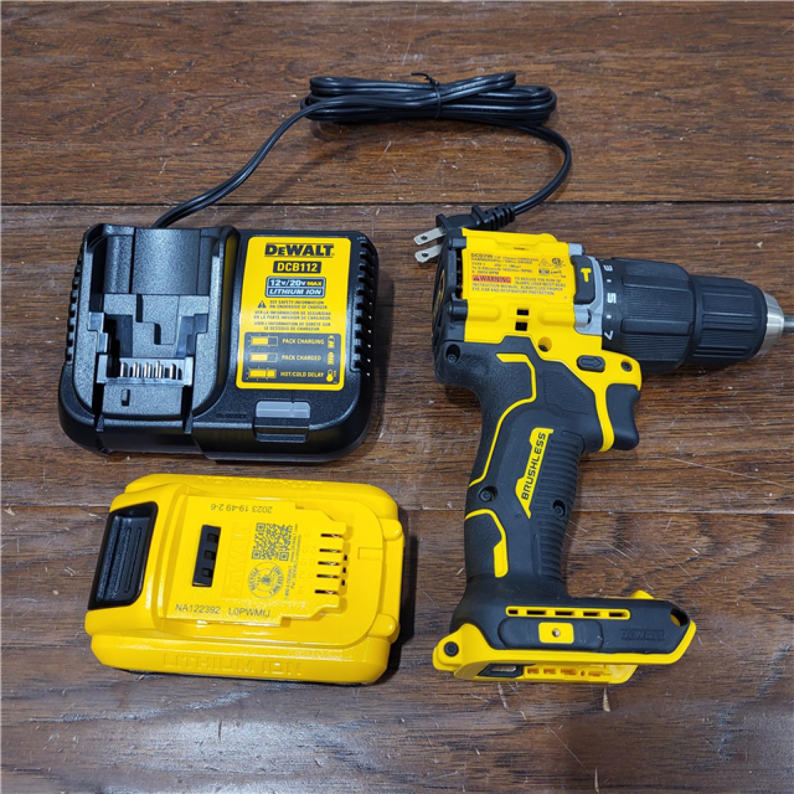 AS-IS DEWALT ATOMIC 20V MAX Lithium-Ion Cordless 1/4 in. Brushless Impact Driver Kit, 5 Ah Battery, Charger, and Bag