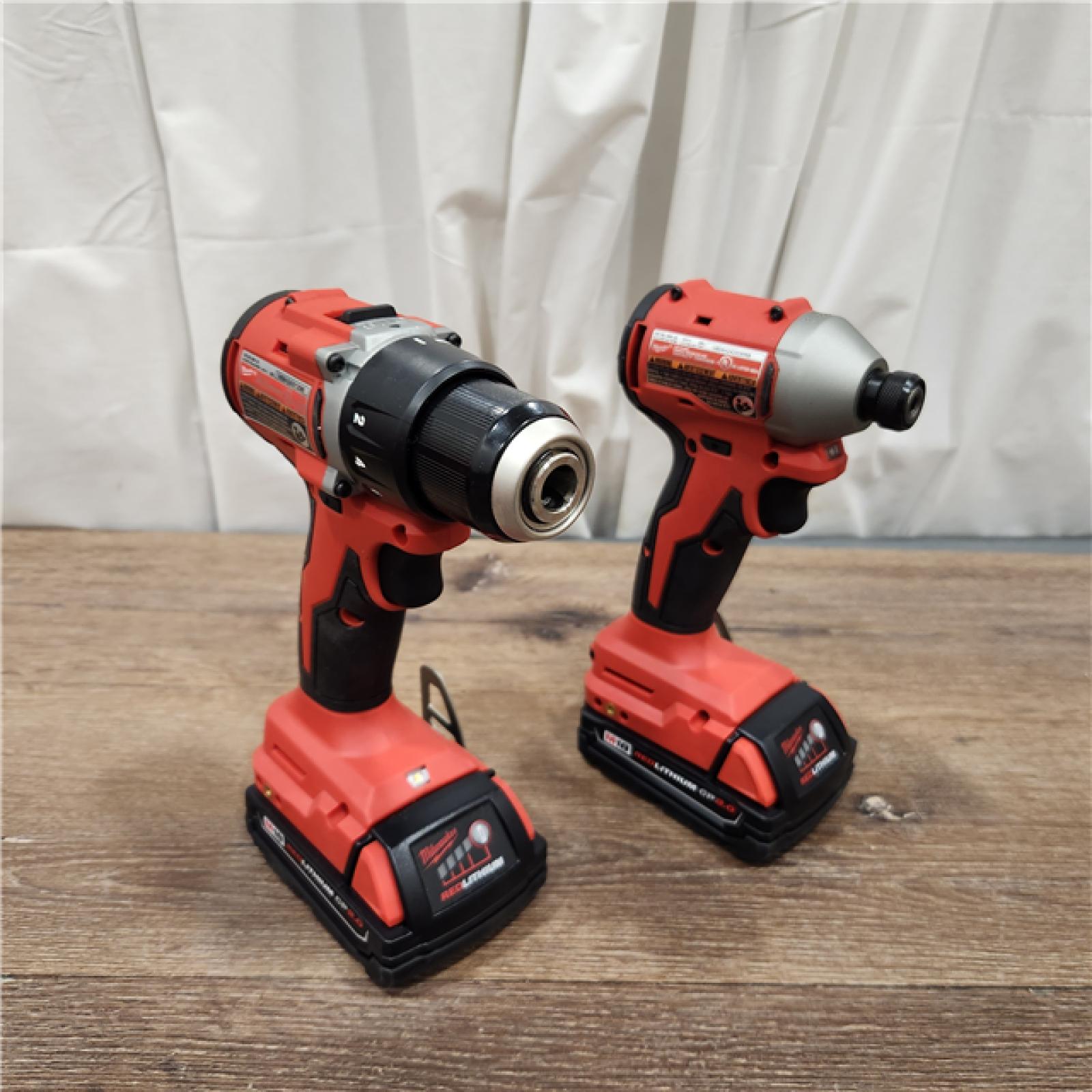 AS-IS M18 18-Volt Lithium-Ion Brushless Cordless Compact Hammer Drill/Impact Combo Kit (2-Tool) with (2) Batteries, Bag