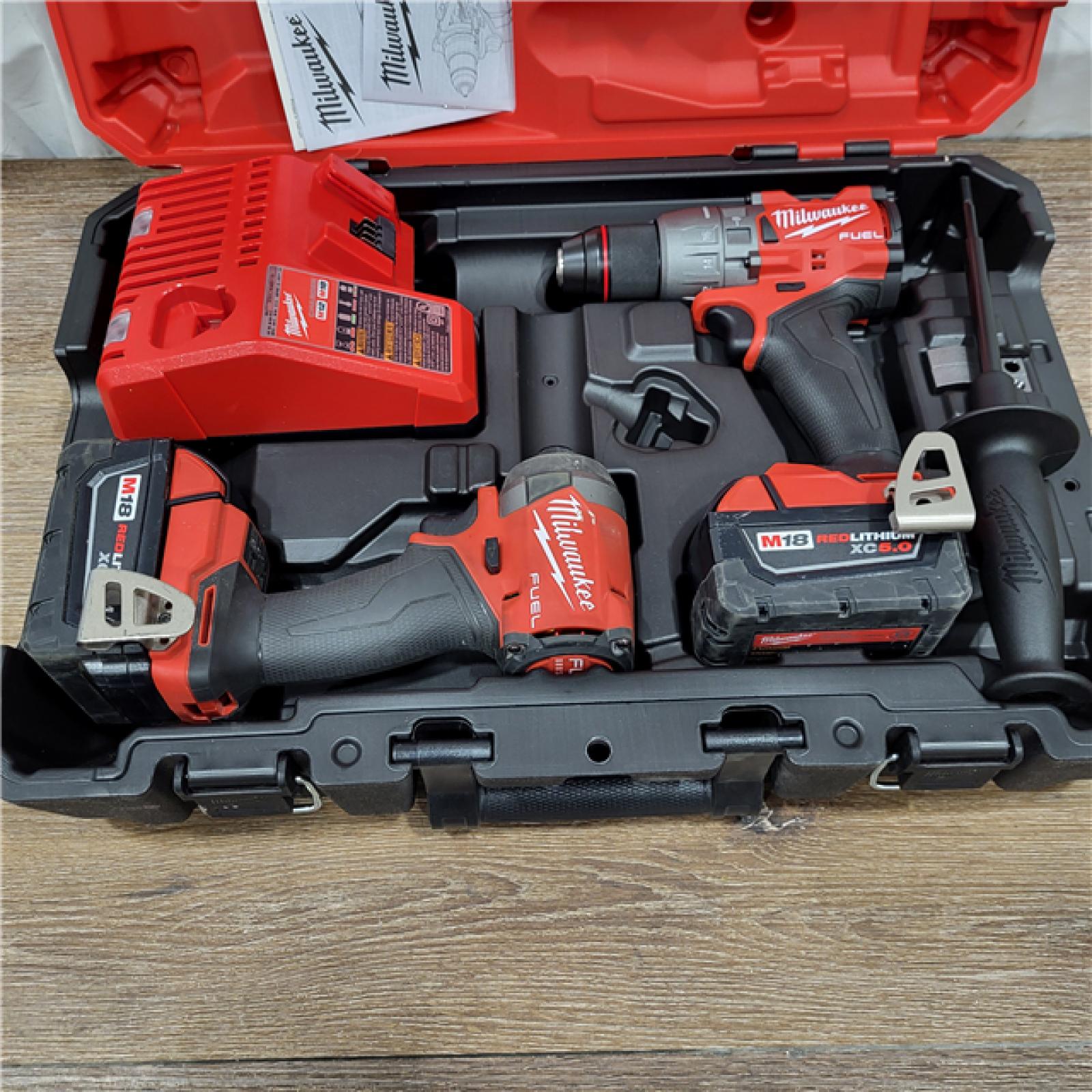 AS-IS M18 FUEL 18V Lithium-Ion Brushless Cordless Hammer Drill and Impact Driver Combo Kit (2-Tool) with 2 Batteries