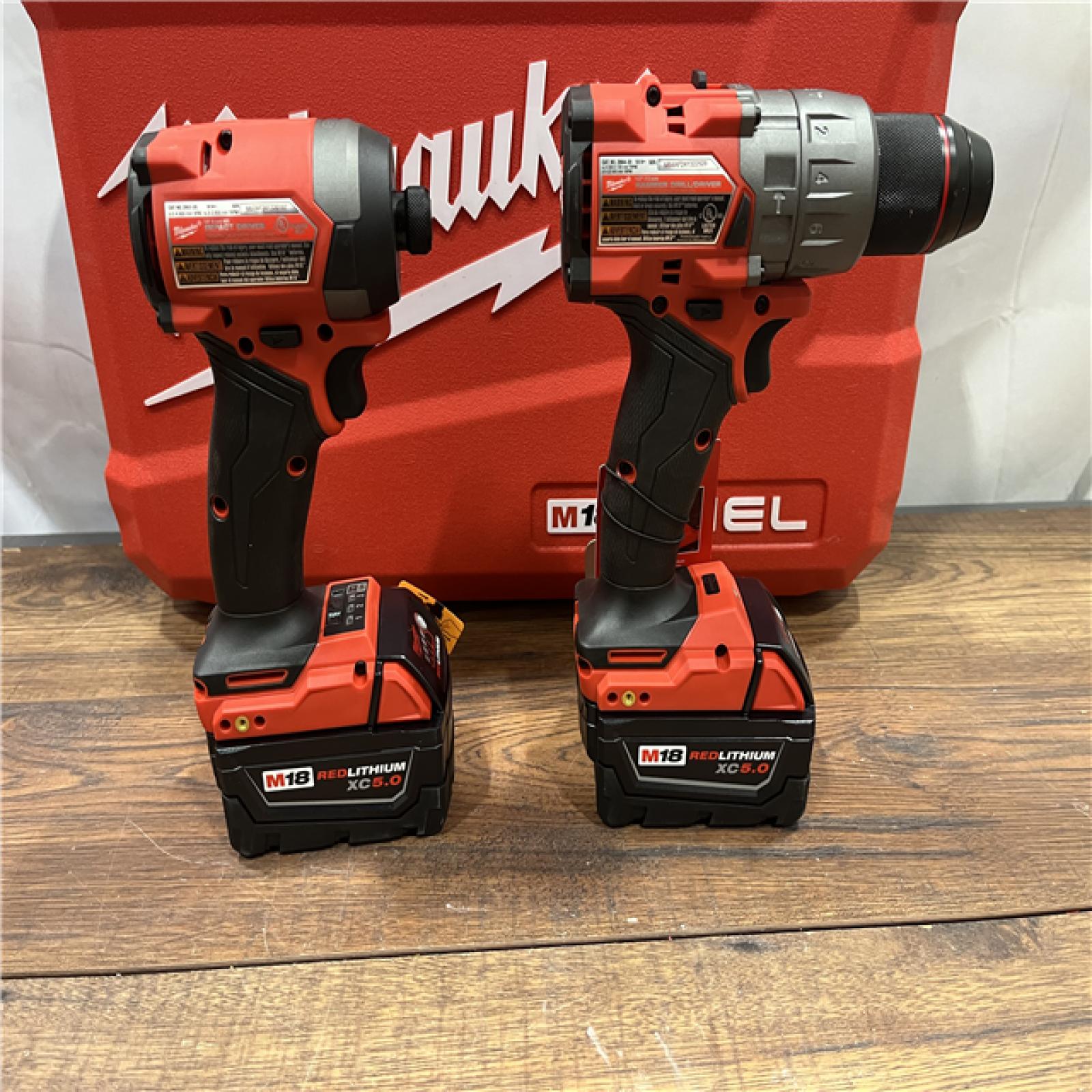 AS-IS Milwaukee M18 FUEL 18V Lithium-Ion Brushless Cordless Hammer Drill and Impact Driver Combo Kit (2-Tool) with 2 Batteries