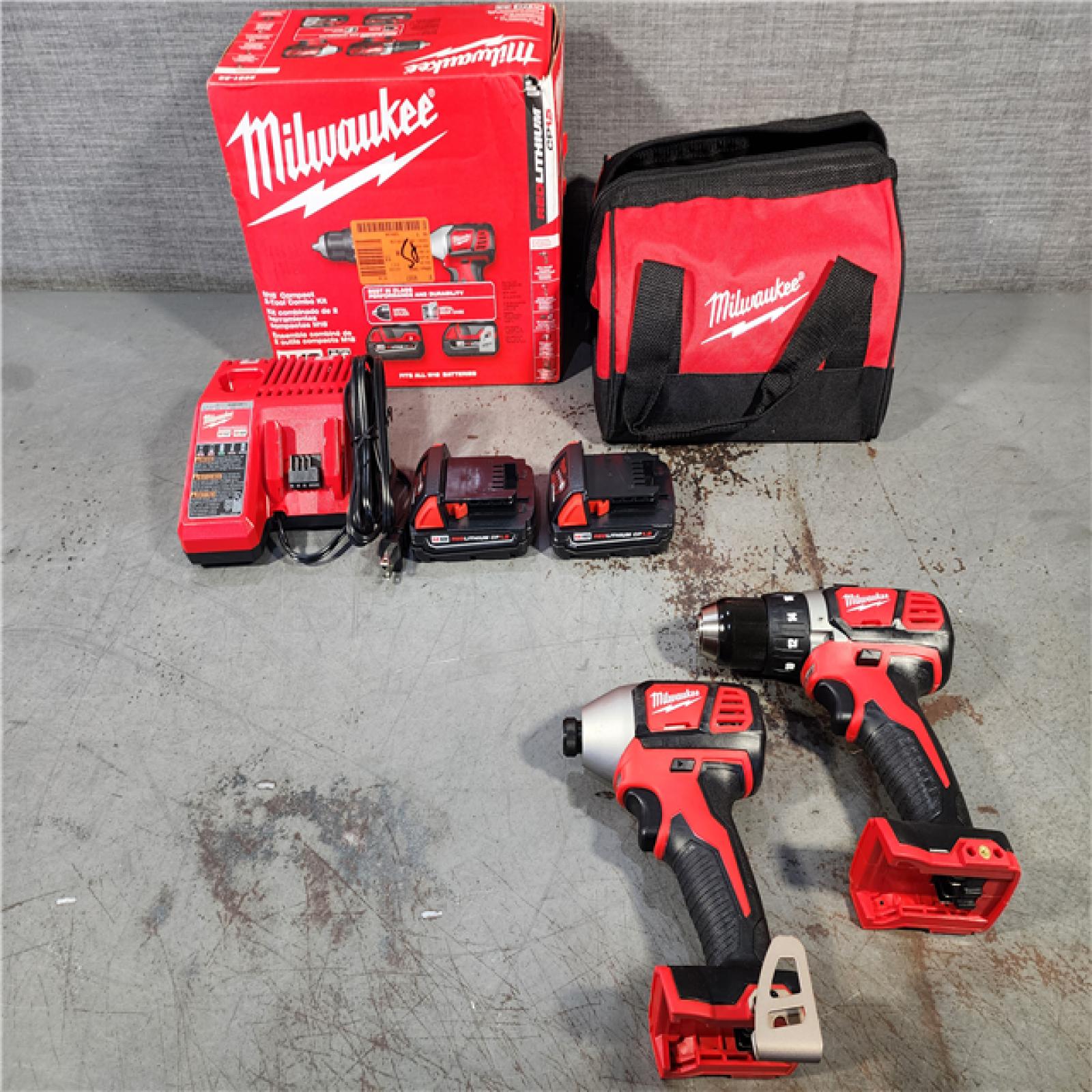 HOUSTON LOCATION - AS-IS Milwaukee M18 18V Cordless Brushed 2 Tool Drill/Driver and Impact Driver Kit