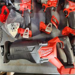 HOUSTON LOCATION - AS-IS Milwaukee M18 FUEL 18V Lithium-Ion Brushless Cordless Combo Kit with Two 5.0 Ah Batteries  1 Charger  2 Tool Bags (7-Tool)