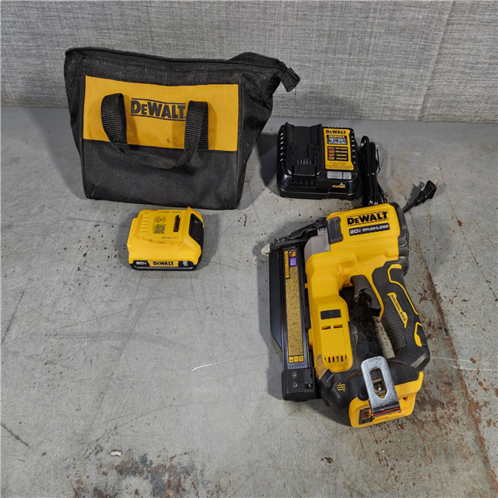 HOUSTON LOCATION - AS-IS DEWALT ATOMIC 20V MAX Lithium Ion Cordless 23 Gauge Pin Nailer Kit with 2.0Ah Battery and Charger