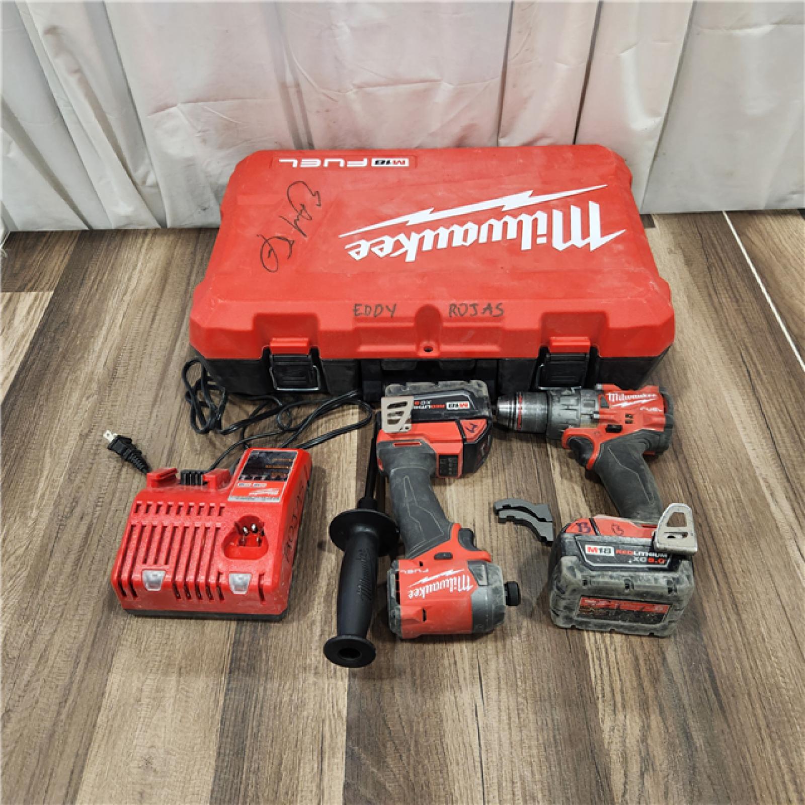 AS IS Milwaukee M18 FUEL 18V Lithium-Ion Brushless Cordless Hammer Drill and Impact Driver Combo Kit (2-Tool) with 2 Batteries