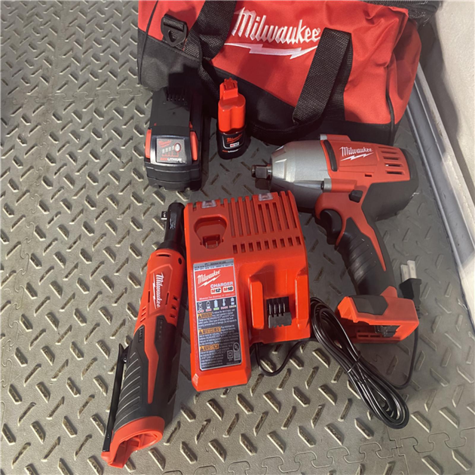 Houston location AS-IS MILWAUKEE M18/M12 12/18V Lithium-Ion Cordless 3/8 in. Ratchet and 1/2 in. Impact Wrench with Friction Ring Combo Kit