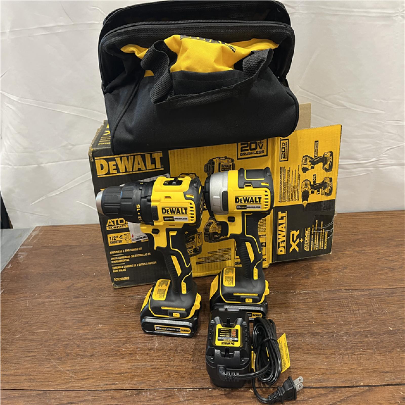 AS-IS 20V MAX XR Hammer Drill and ATOMIC Impact Driver 2 Tool Cordless Combo Kit with (2) 4.0Ah Batteries, Charger, and Bag