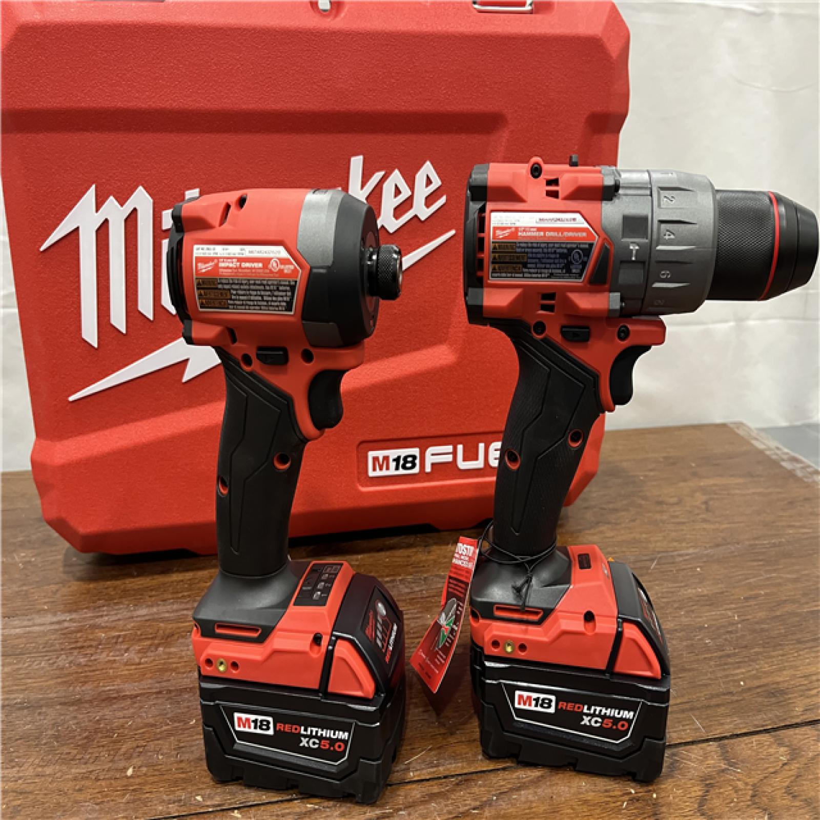 AS-IS Milwaukee M18 FUEL 18V Lithium-Ion Brushless Cordless Hammer Drill and Impact Driver Combo Kit (2-Tool) with 2 Batteries