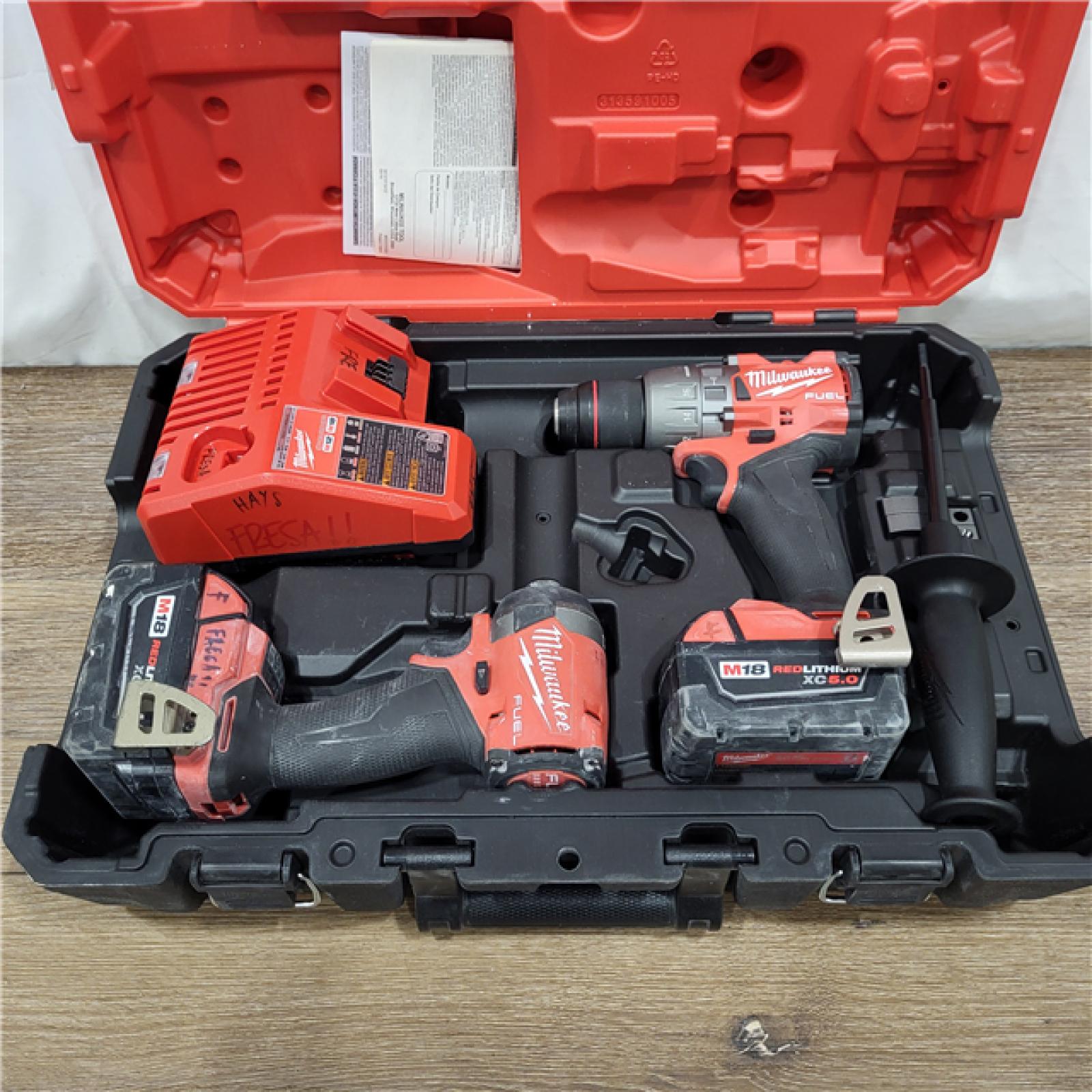 AS-IS M18 FUEL 18V Lithium-Ion Brushless Cordless Hammer Drill and Impact Driver Combo Kit (2-Tool) with 2 Batteries