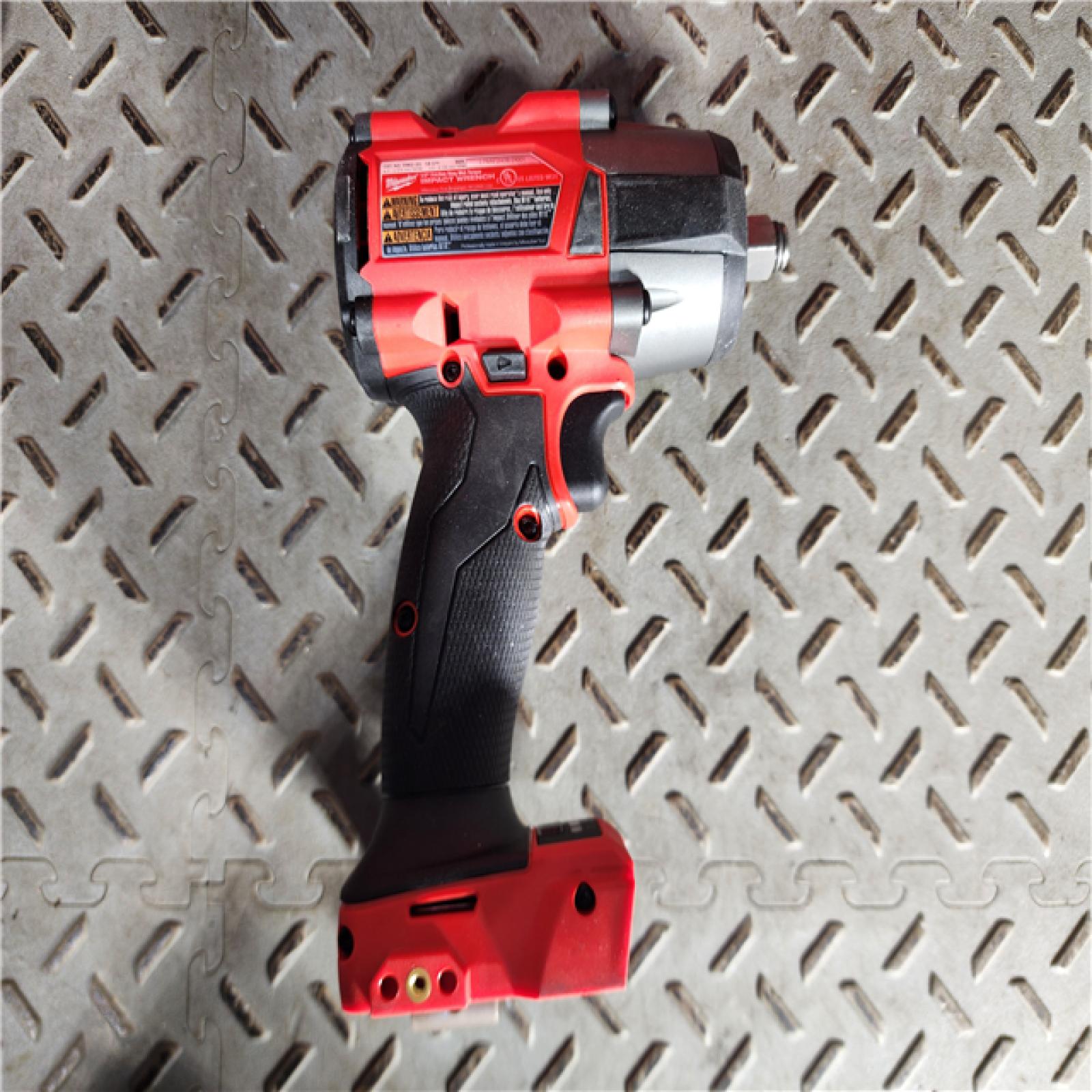 HOUSTON LOCATION - AS-IS (APPEARS LIKE NEW) Milwaukee M18 FUEL 1/2Inch Mid-Torque Impact Wrench with Friction Ring Kit - Two 5.0Ah Batteries, Model 2962-22